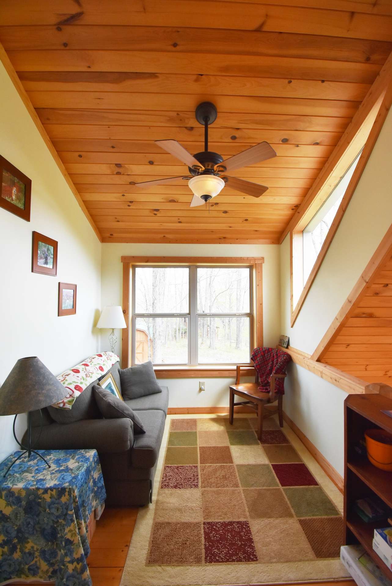 A cozy loft area overlooks the great room and the perfect place for reading or working puzzles.