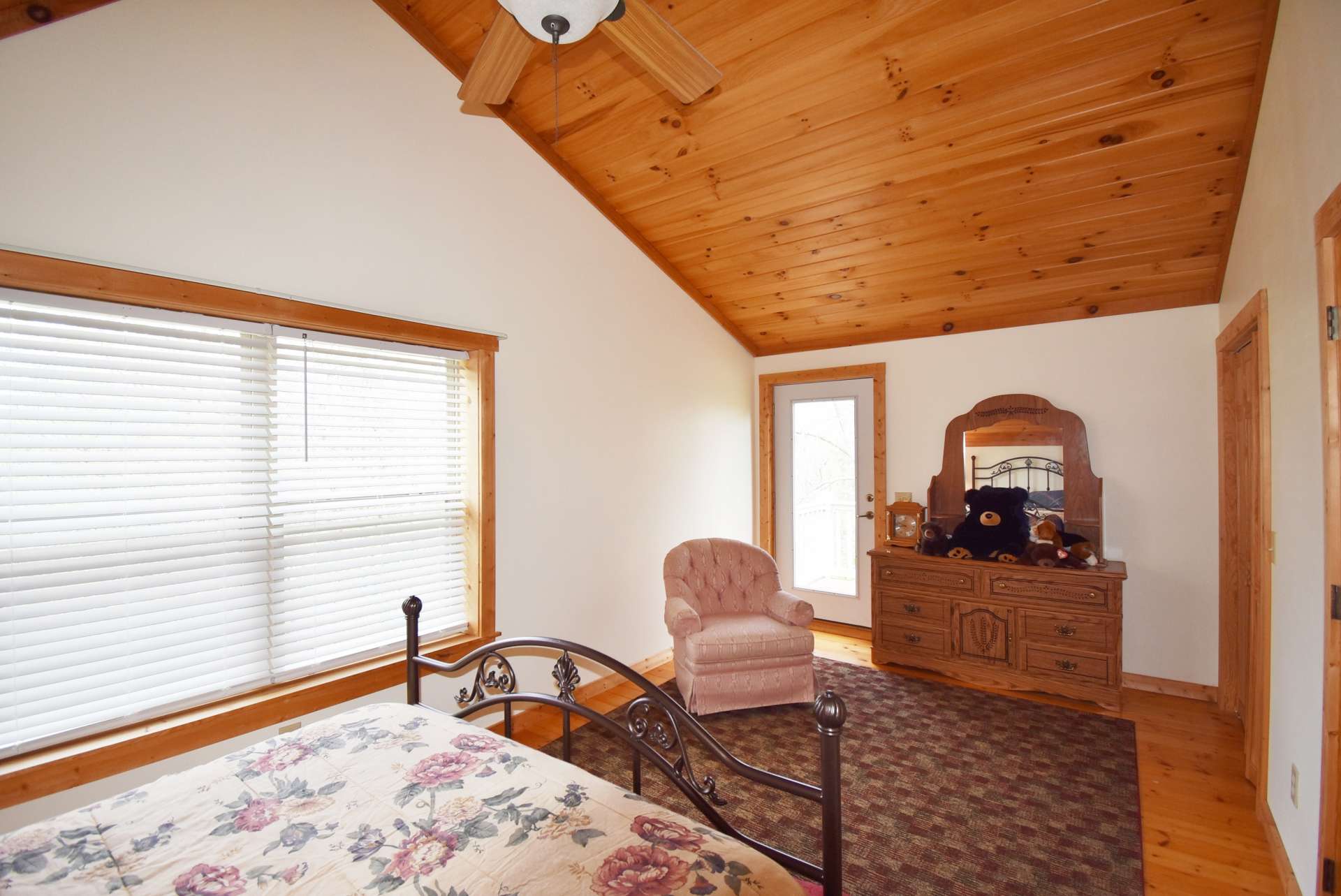 The  upper level features wood floors.  The cabin's furniture stays, with the exception of a few personal items and tools.