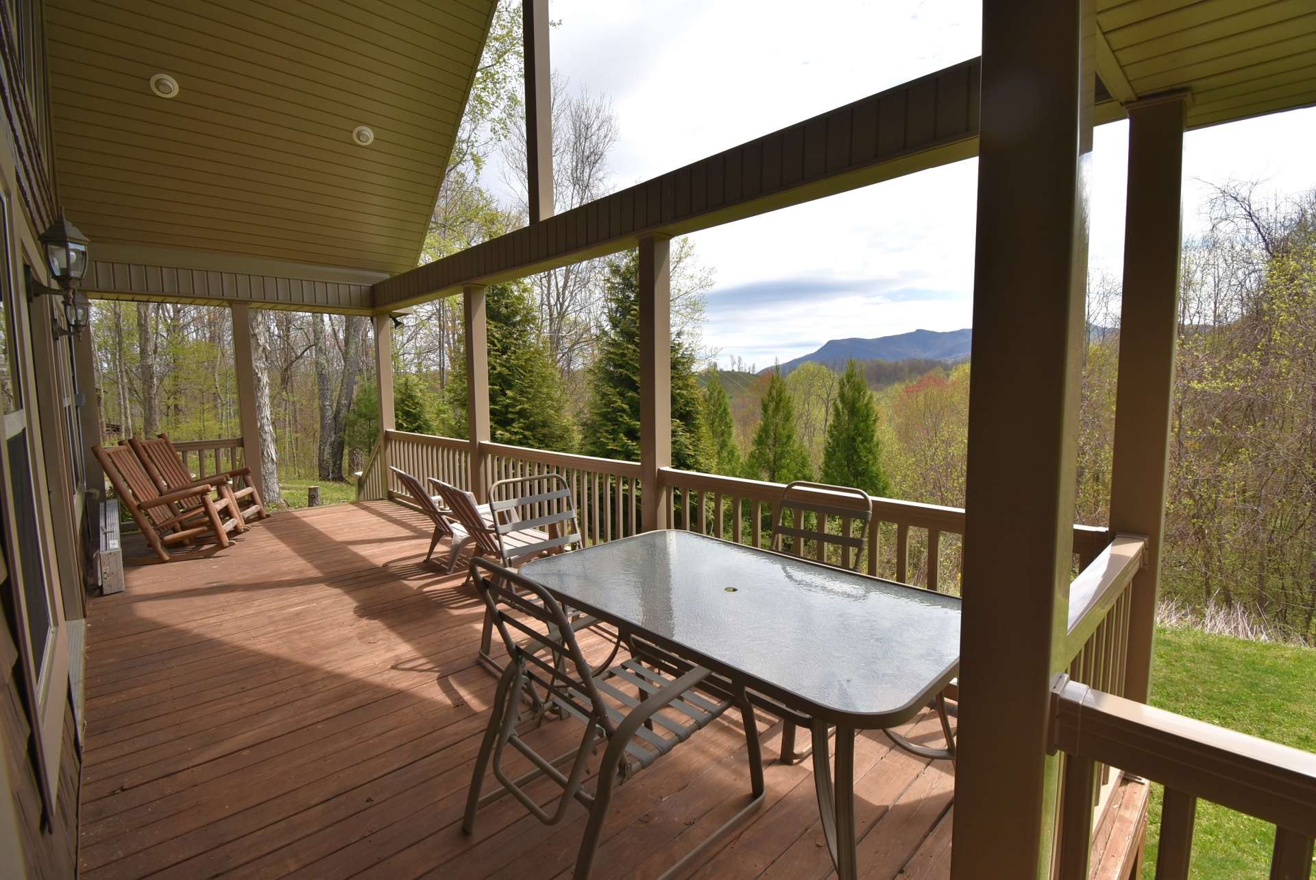 For your outdoor grilling, dining, and entertaining, this home offers a large vaulted covered porch where you will enjoy views of  Three Top Mountain and seasonal views of the Peak.