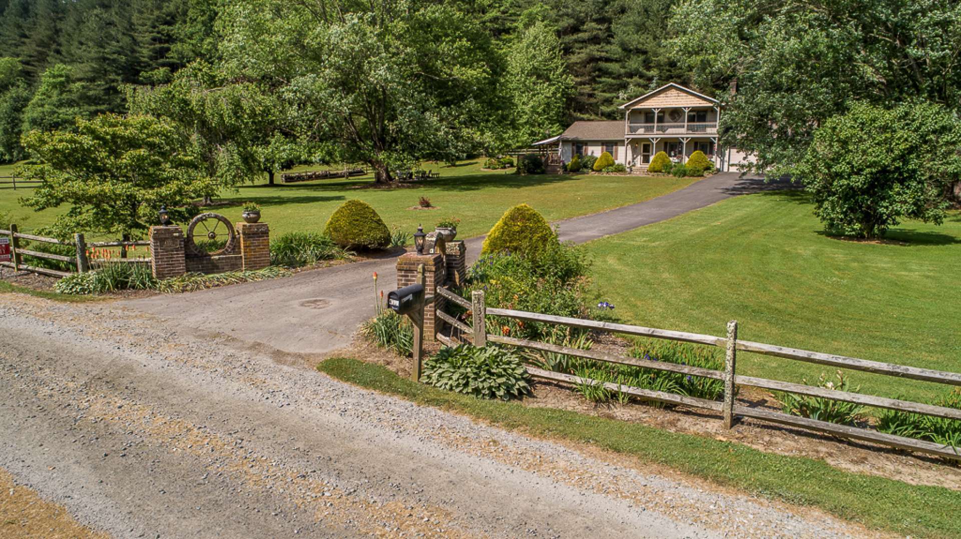 Nestled among this pristine setting is a spacious remodeled 4-bedroom, 2-bath country home accessed via a private drive.