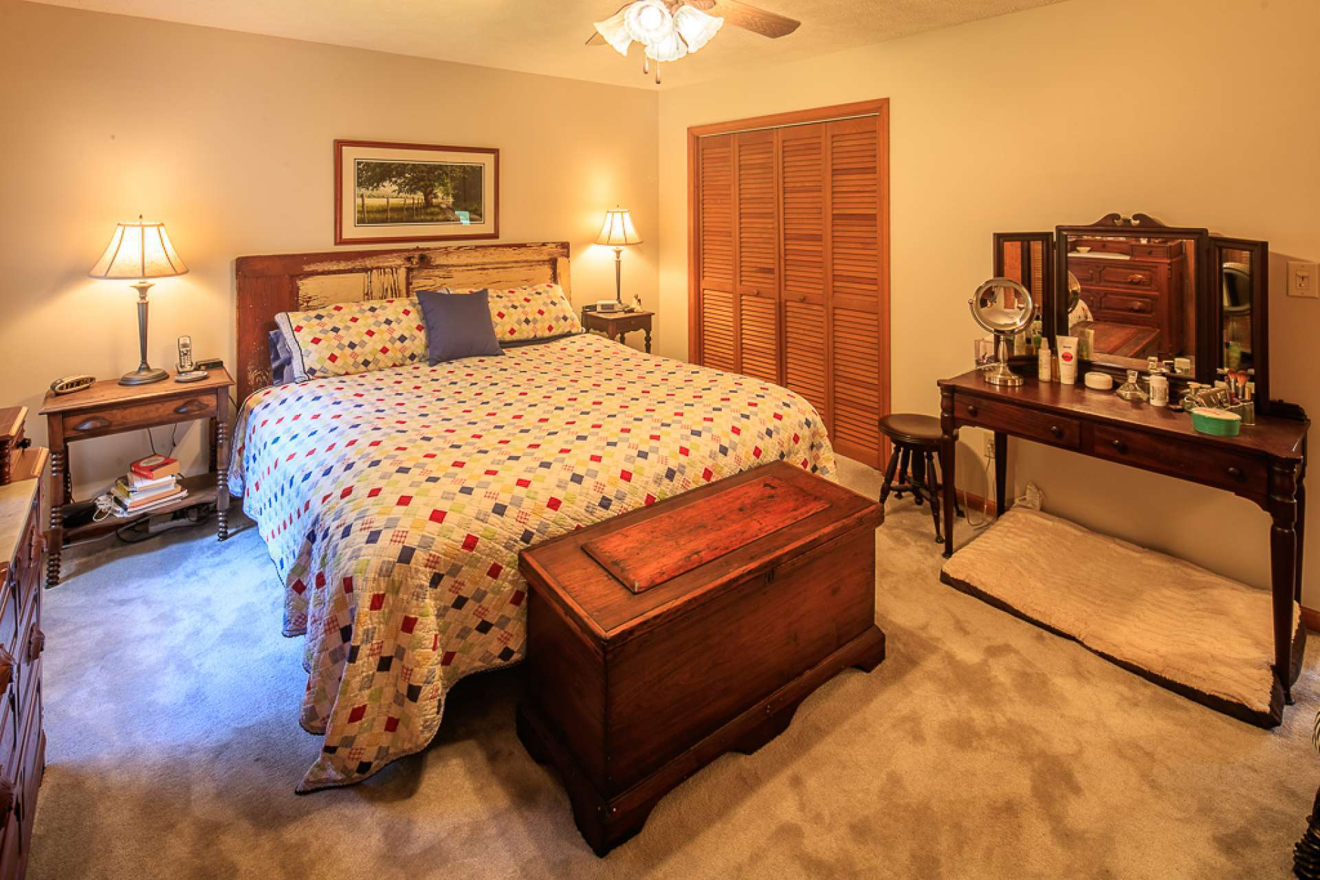 This spacious bedroom on the upper level offers a private bath and could serve as a second master option.