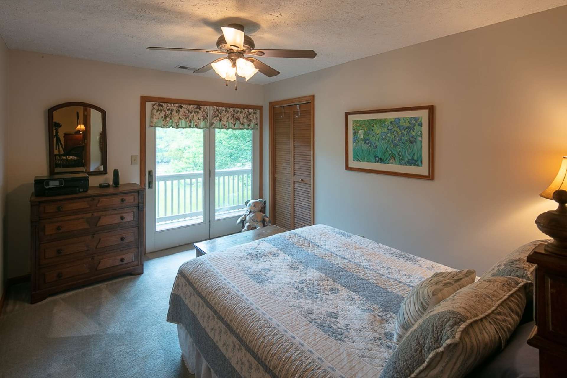 The upper level offers three bedrooms and a full bath with two vanities and tub/shower combo. This upper level bedroom has access to the upper level balcony.