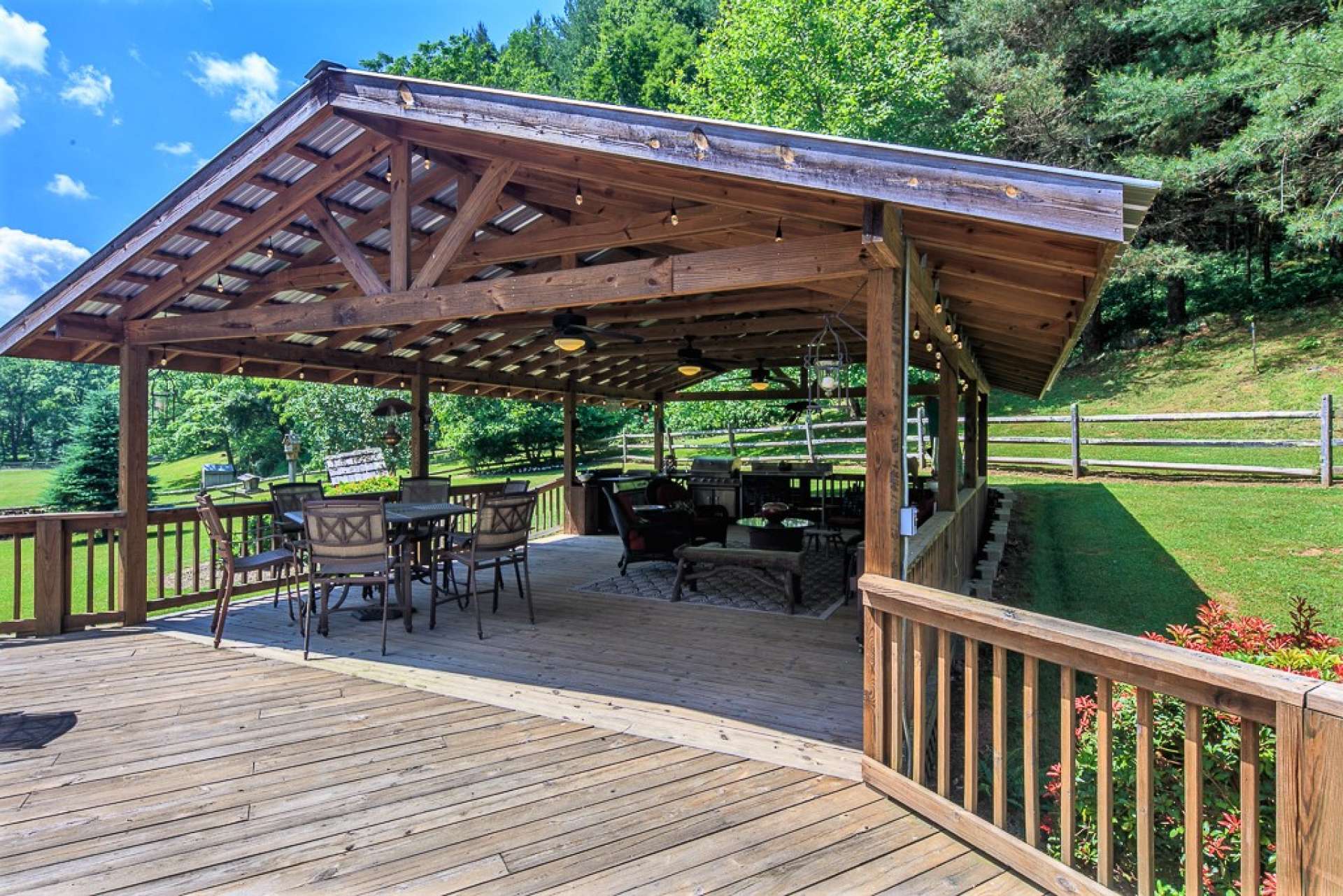 This home is an entertainers dream! In addition to the indoor entertaining space, this incredible outdoor summer kitchen offers over 600 square feet of covered entertaining space.