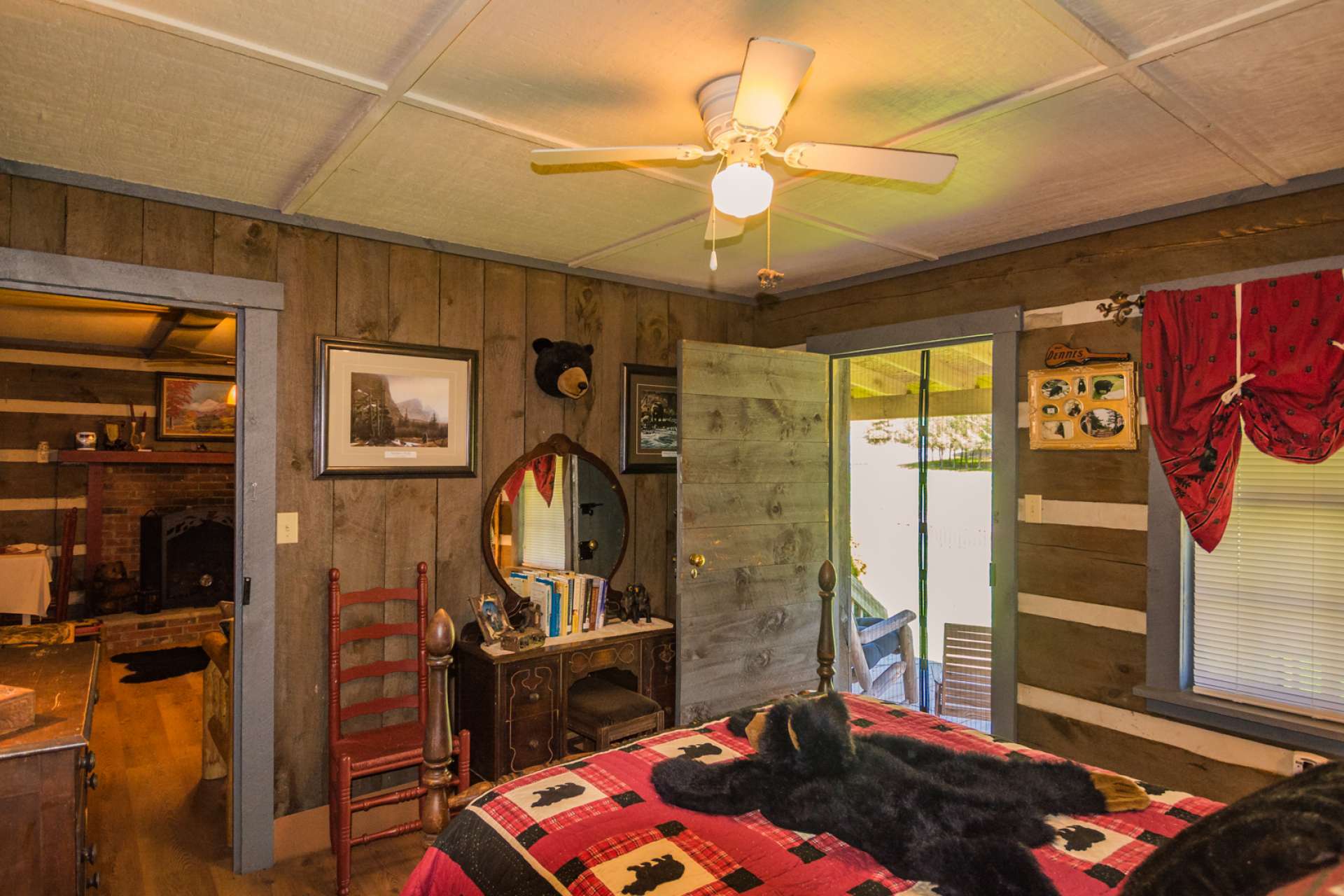 This bedroom offers easy access to the covered porch