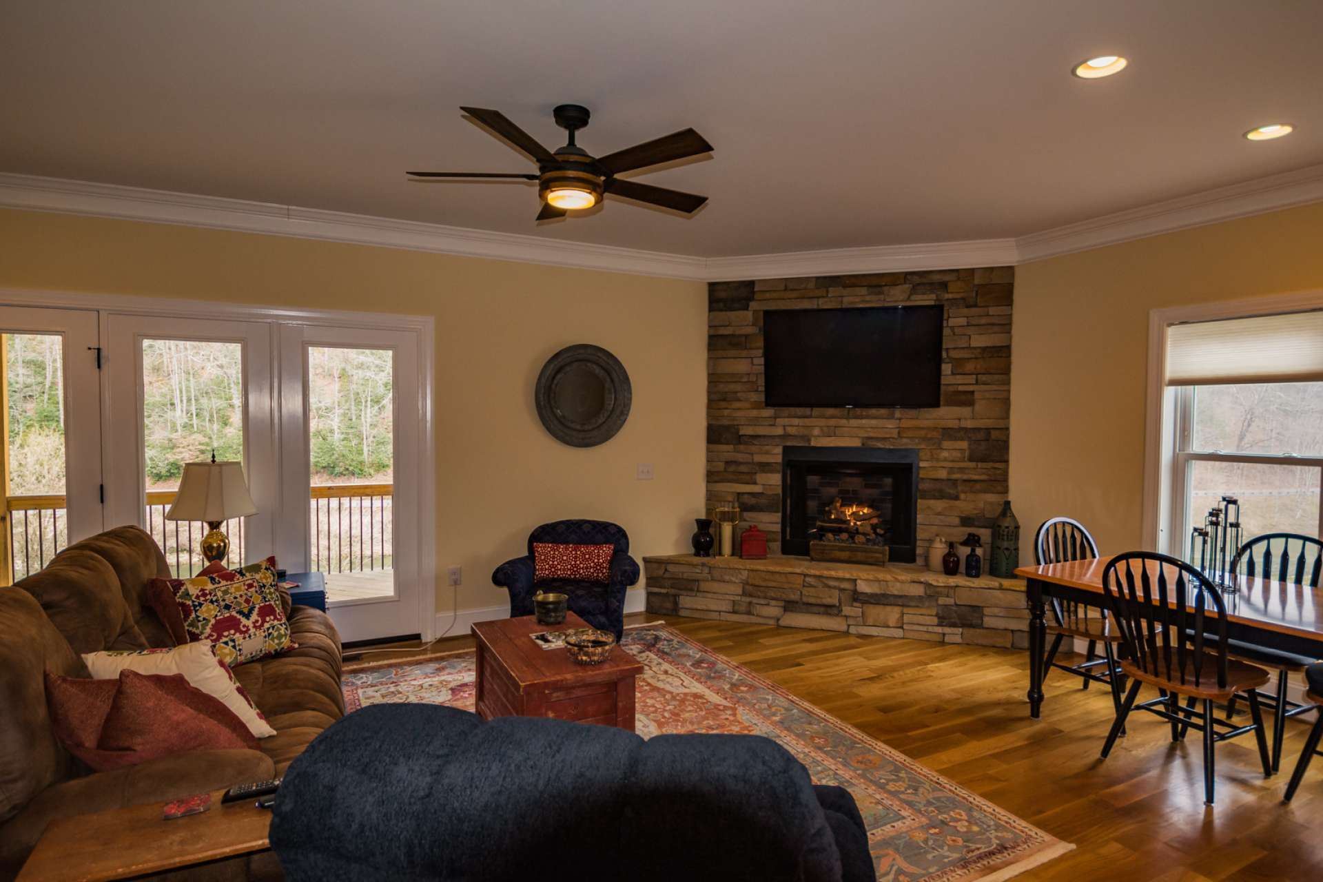 Entering the home, you are drawn to the cozy stone fireplace with gas logs in the great room where beautiful Oak floors enhance the warm feel of the home.