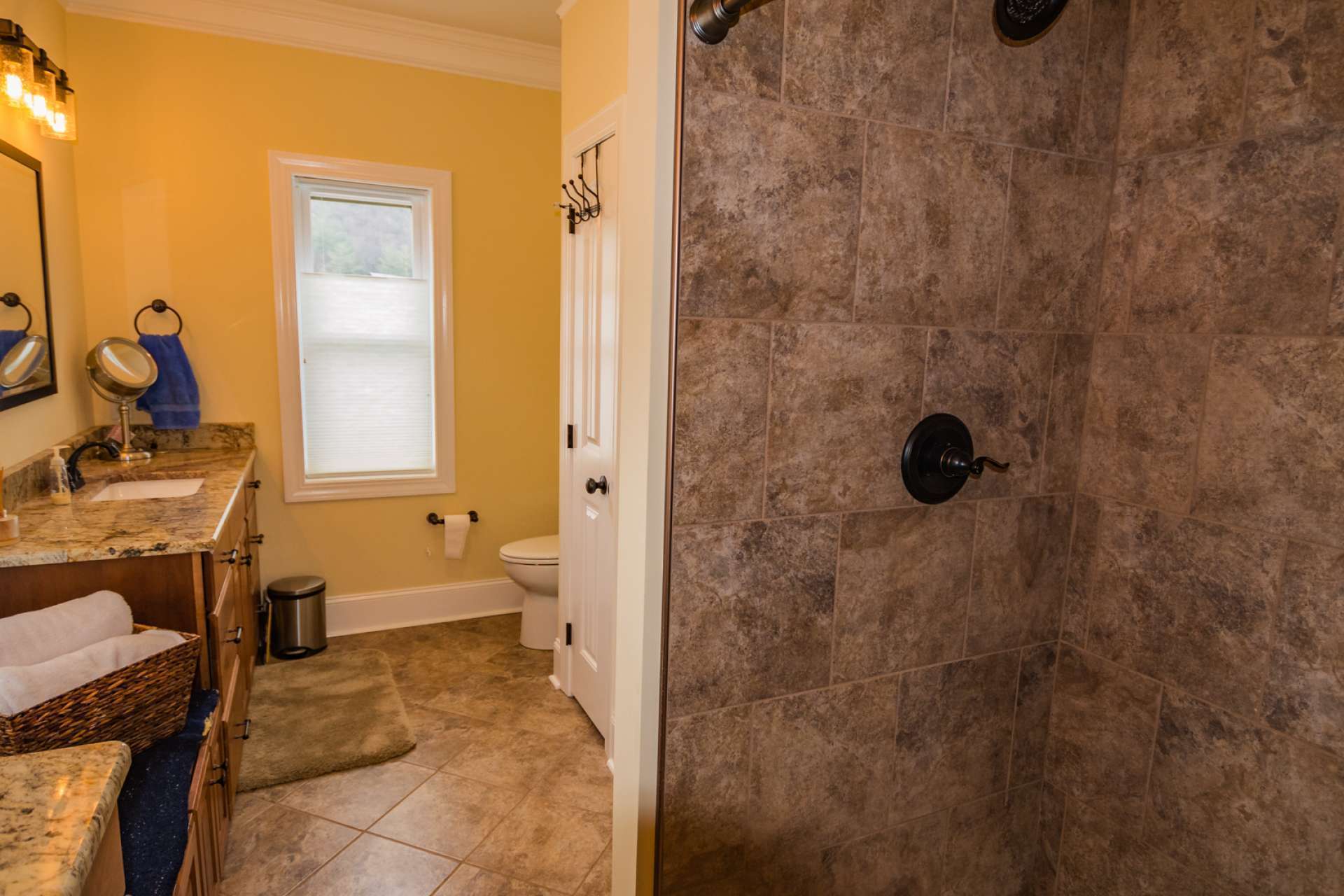 A half bath and laundry room complete the main level.