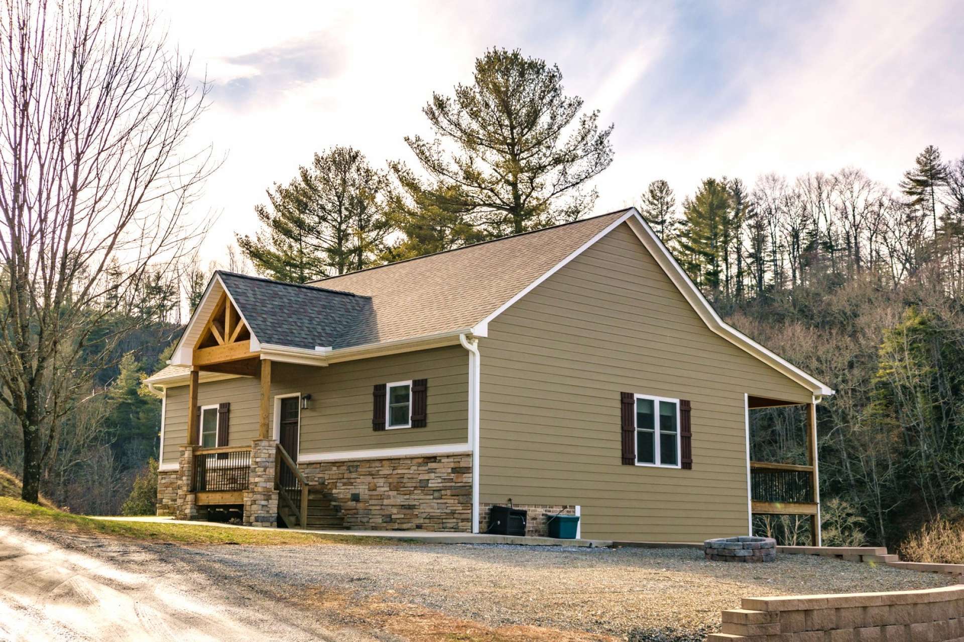 As you approach the home, you will notice the nice parking space and the low maintenance exterior Hardie siding.