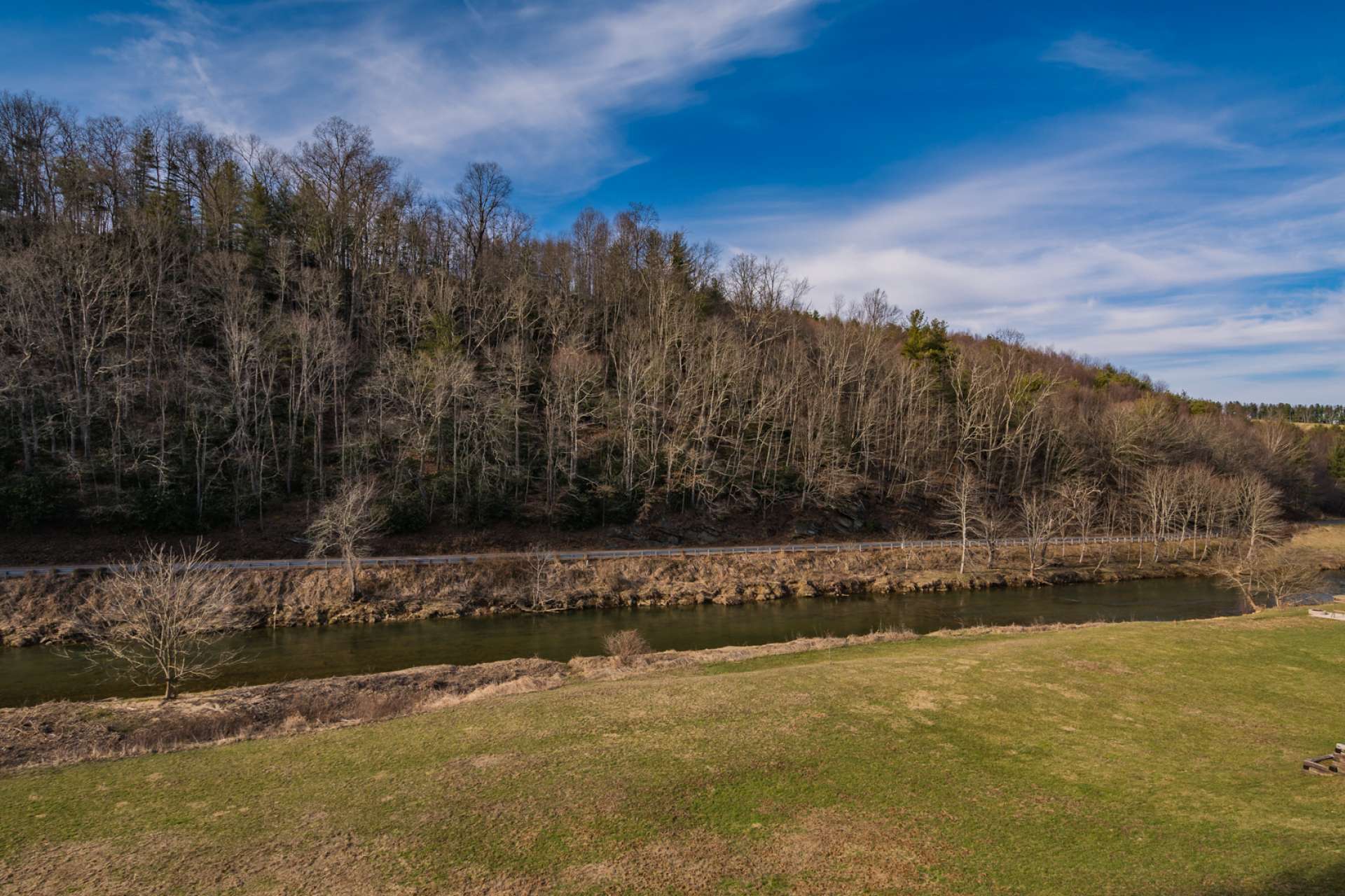 You will also enjoy the popular scenic biking trail along Railroad Grade Road and the New River.  Notice the easy access into the river for fishing, kayaking and tubing. A combination of lots 17 and 18 provides a beautiful 2.25 acre setting with plenty of nice river frontage for outdoor play.