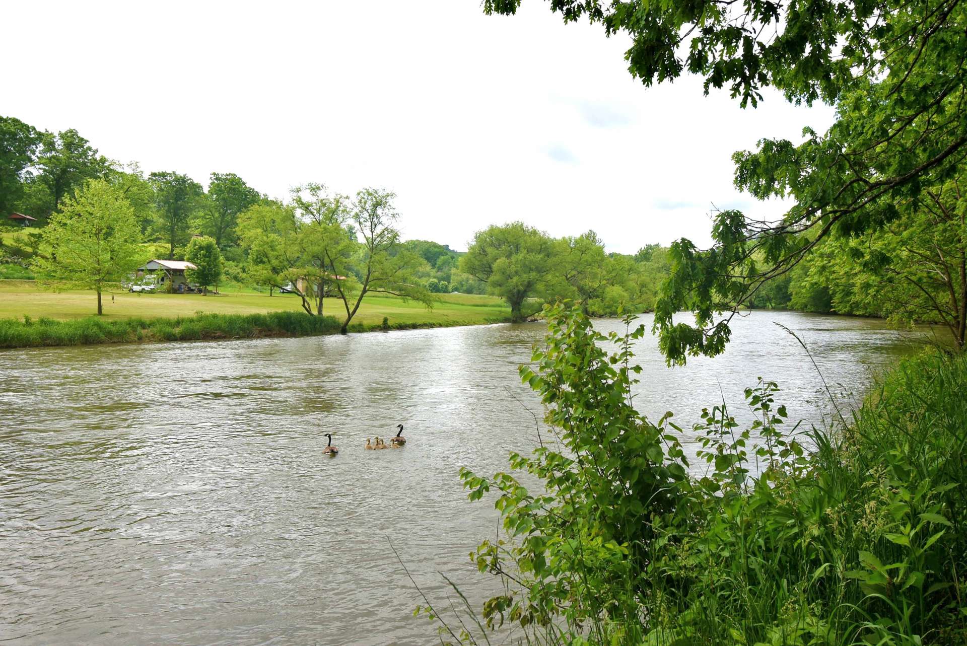 Imagine relaxing on the porch or deck of your newly constructed mountain retreat cabin or  home and enjoying the sounds of the  river as it flows gently by.