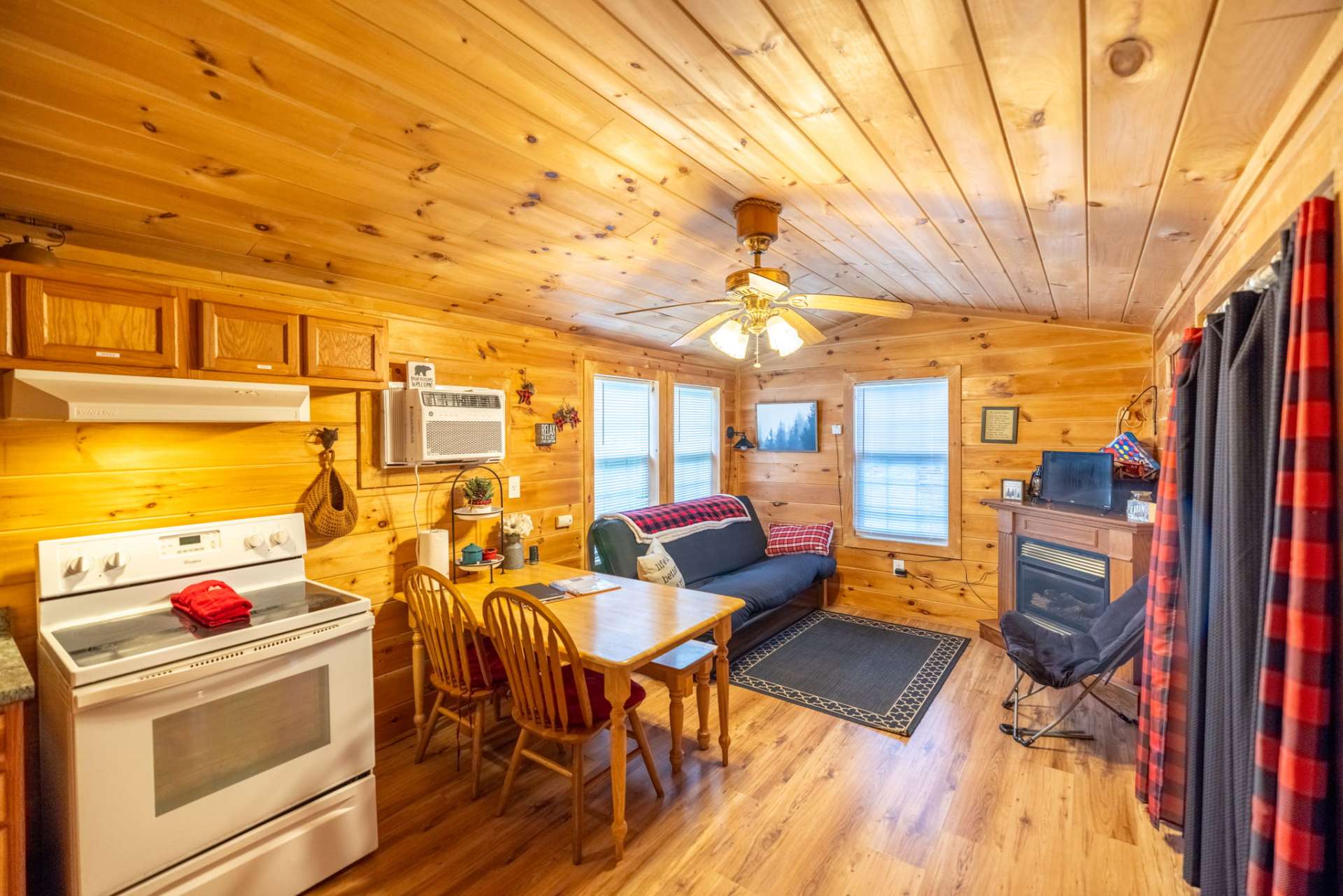 A second cabin with the same floor plan and the same rustic appeal