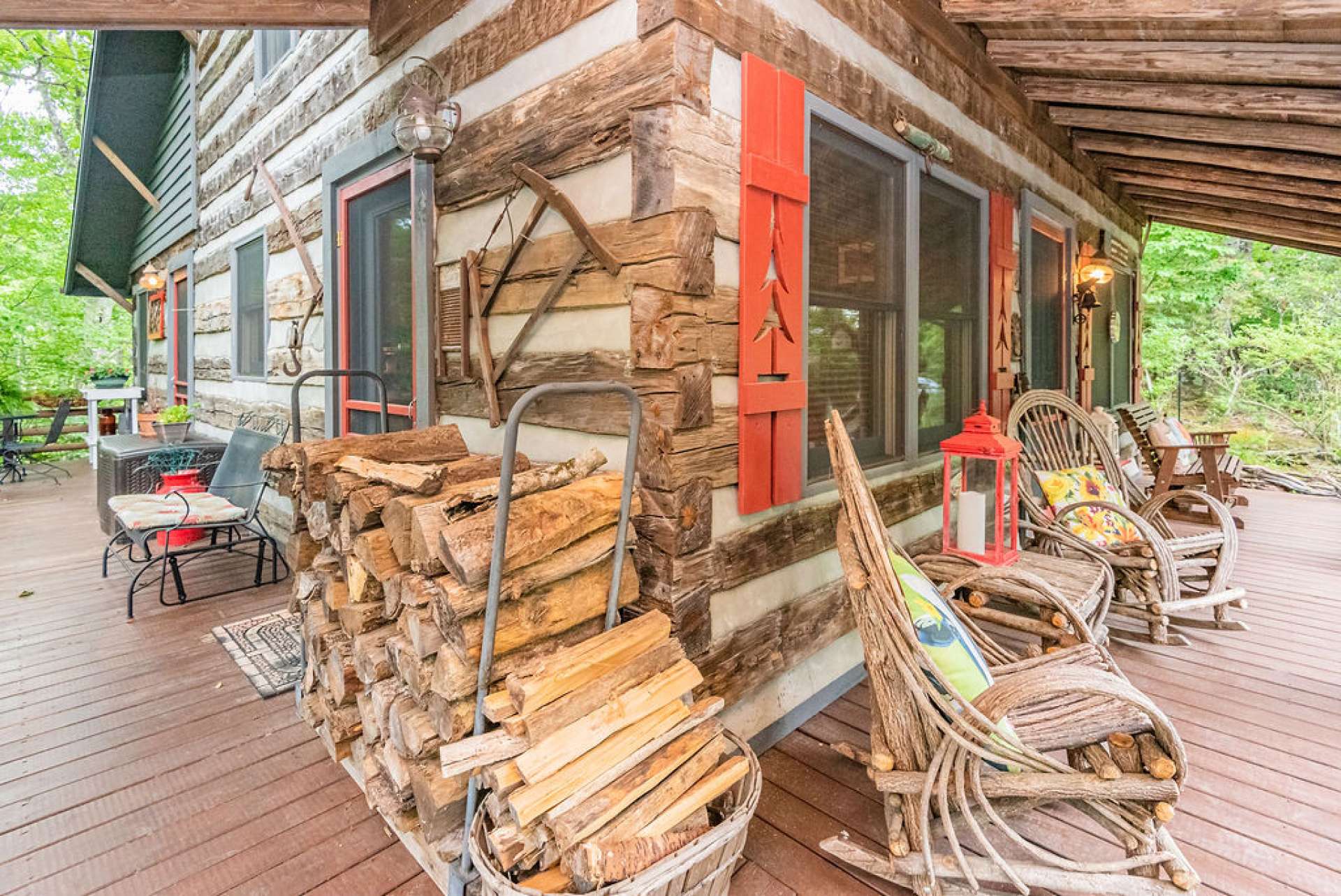 Covered front porch wraps around to an open deck area.