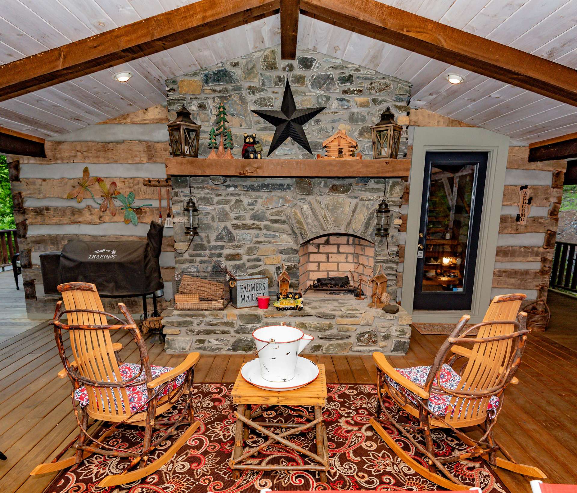 The covered porch with outdoor fireplace is ideal for making family memories enjoying outdoor barbecues, eating s'mores and telling ghost stories.