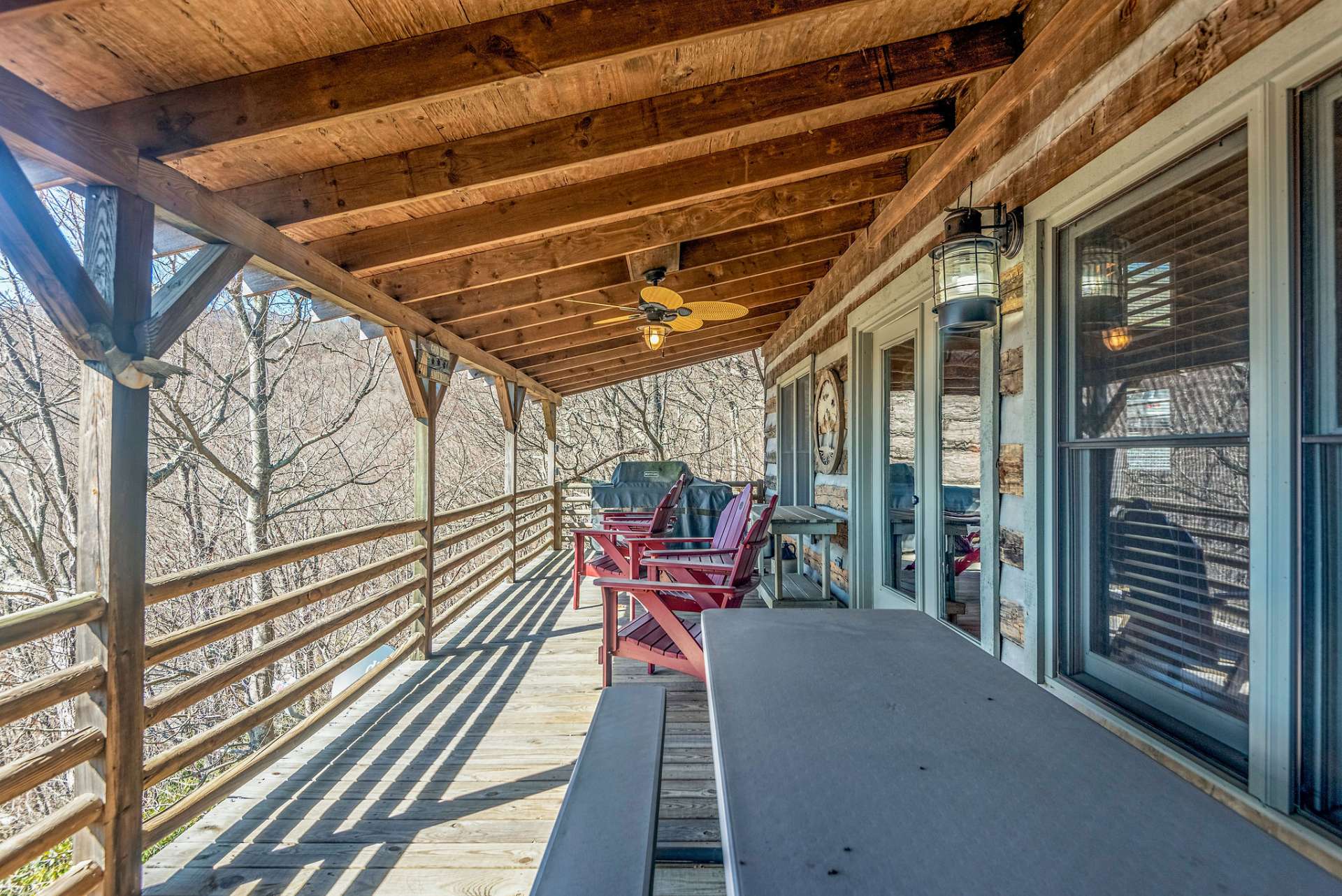 Expansive outdoor living area on the main covered deck. Perfect for all weather entertaining.