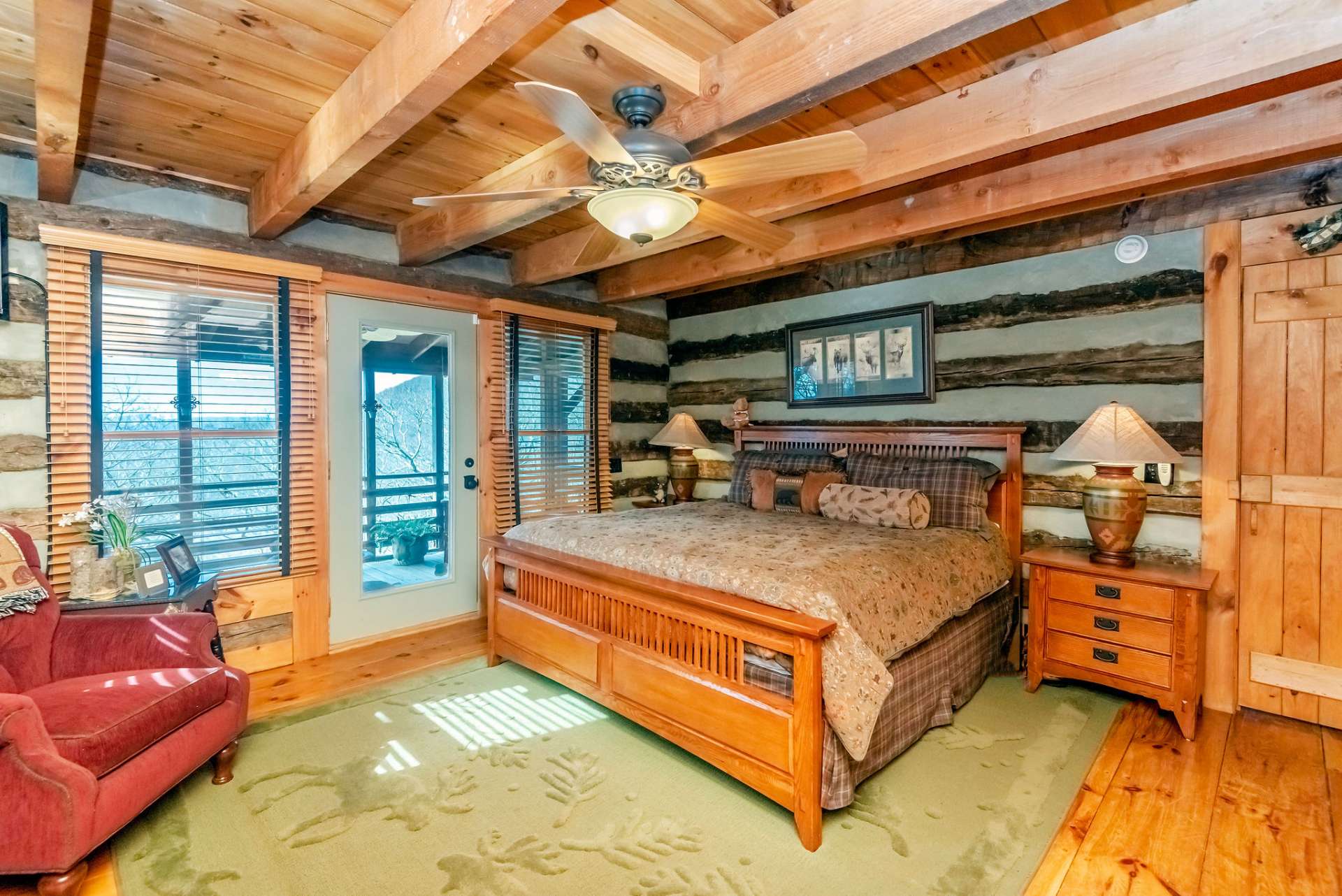 The primary bedroom has more than enough space for a king size bed, sitting area, dresser, and two nightstands.