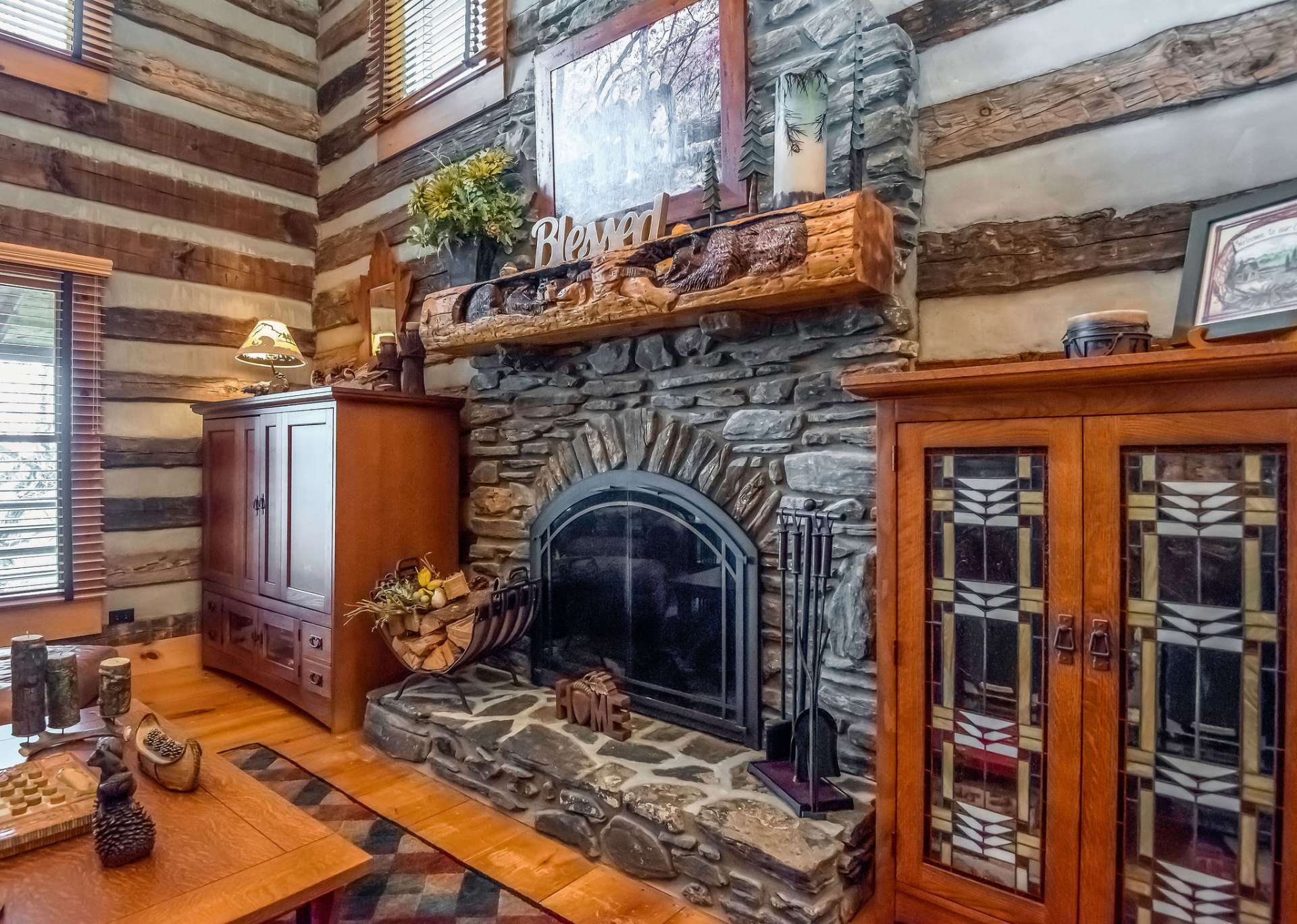 The craftsmanship of this stone fireplace and custom mantel are pieces of natural art to sit and admire.