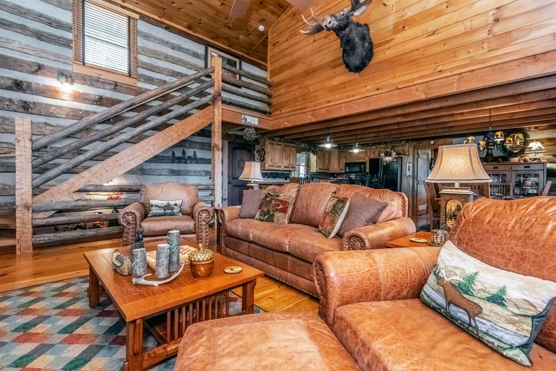 Beautiful log handrail is true to the antique style of this cabin.