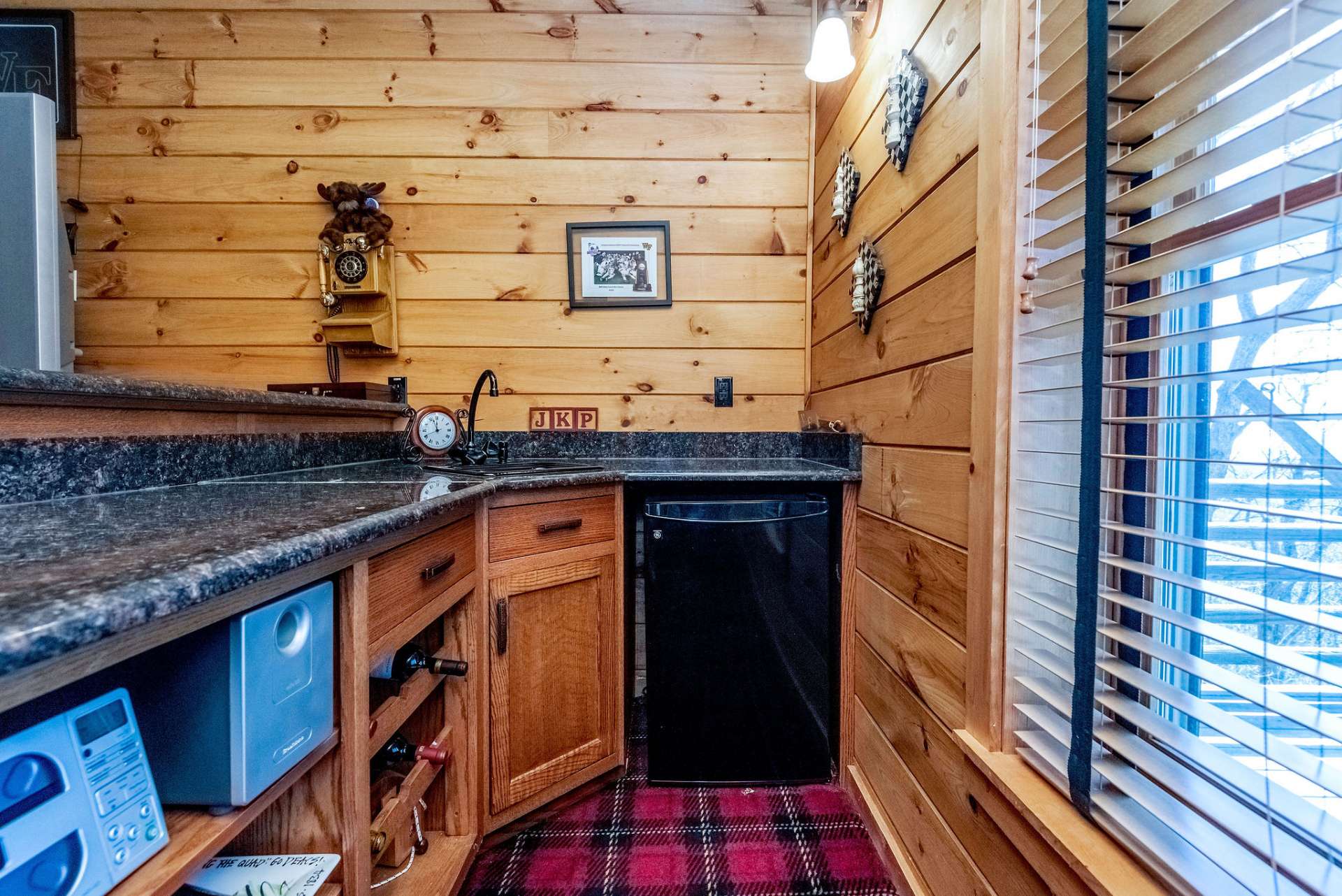 Lower level wet bar is essential for entertaining at a higher level.