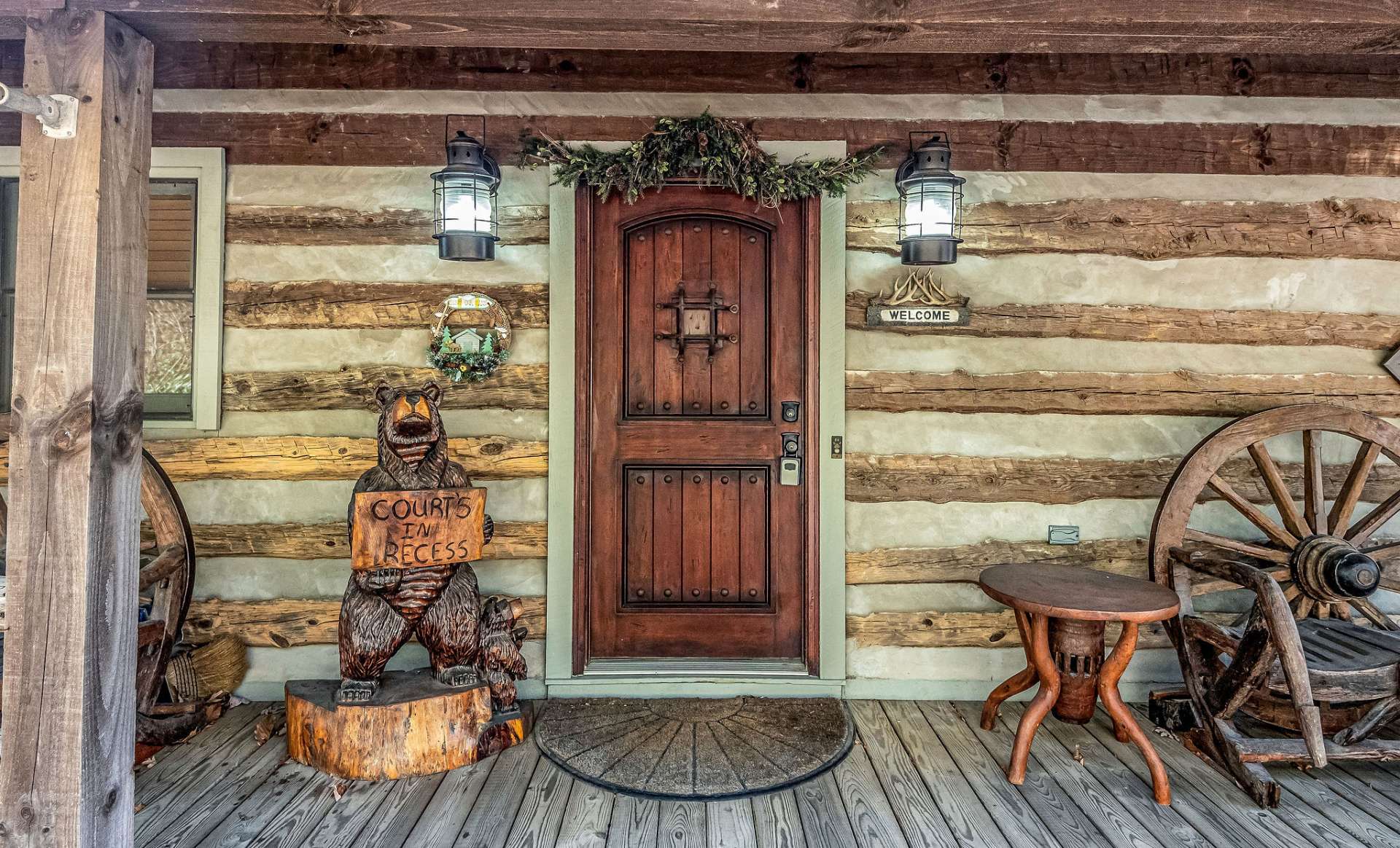 Your mountain oasis awaits you. Notice the custom wood door with speakeasy window and lantern lights used to greet your friends.