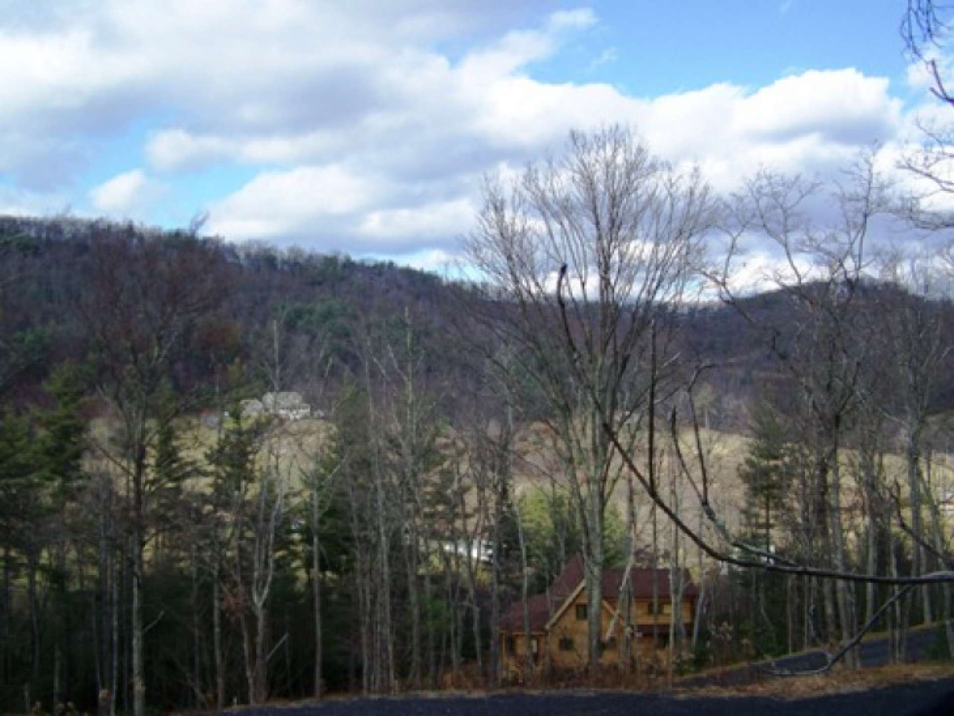 Enjoy this view from the covered porch or deck of your mountain cabin or home constructed here on lot 1.