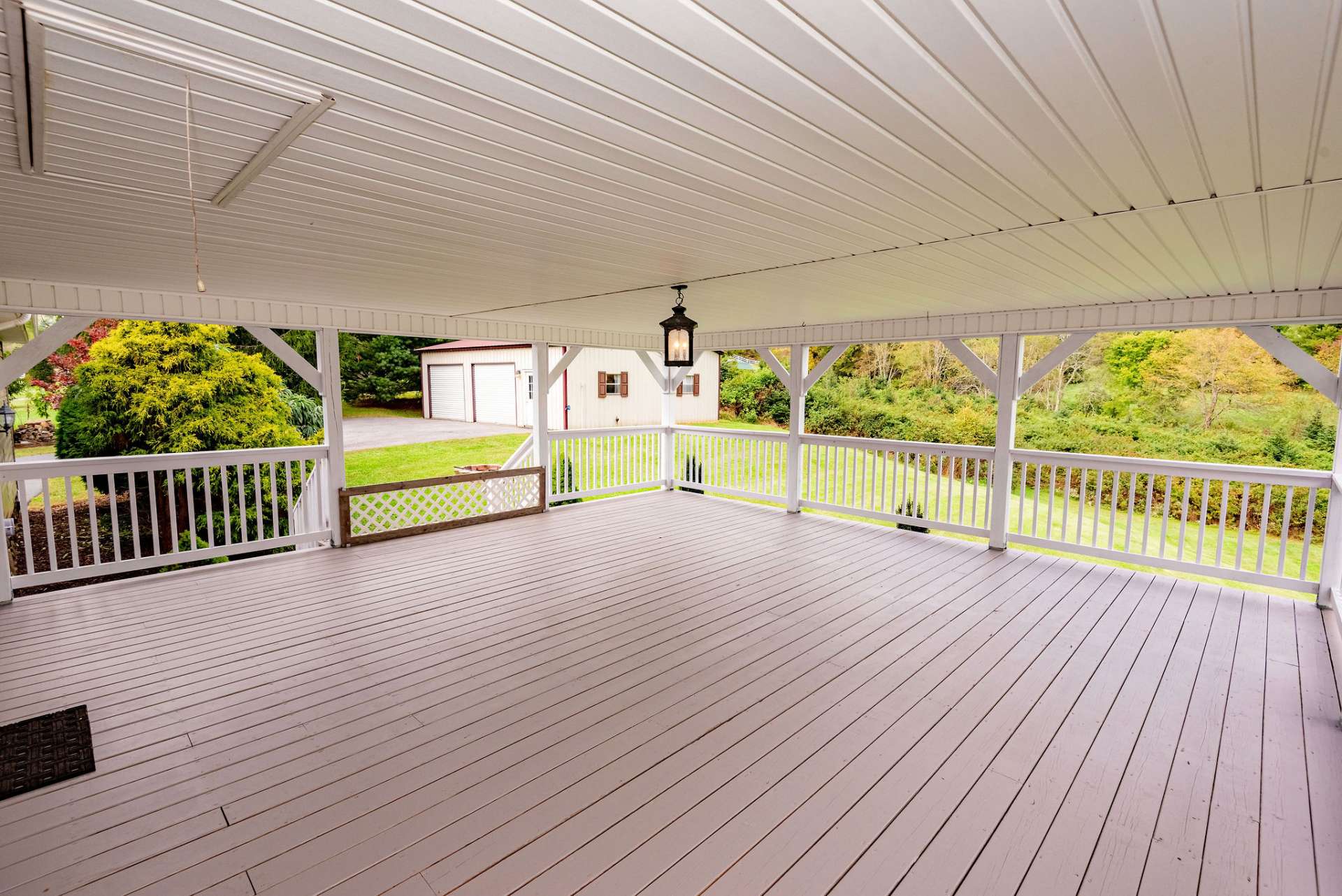 This large porch is perfect for entertaining or a toddler riding their tricycle.
