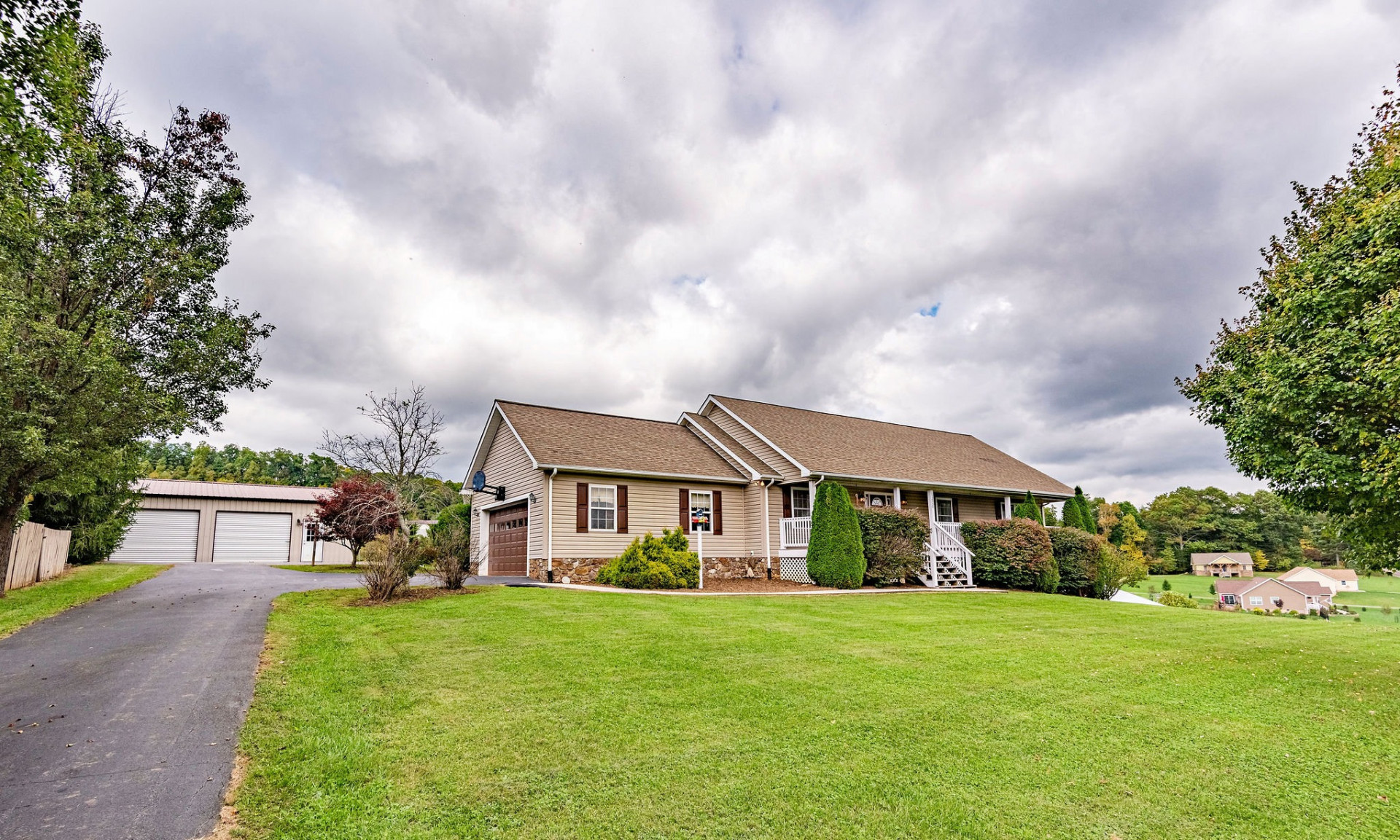 Drive up to this well cared for Southern Ashe County home everyday and your heart will swell with pride.