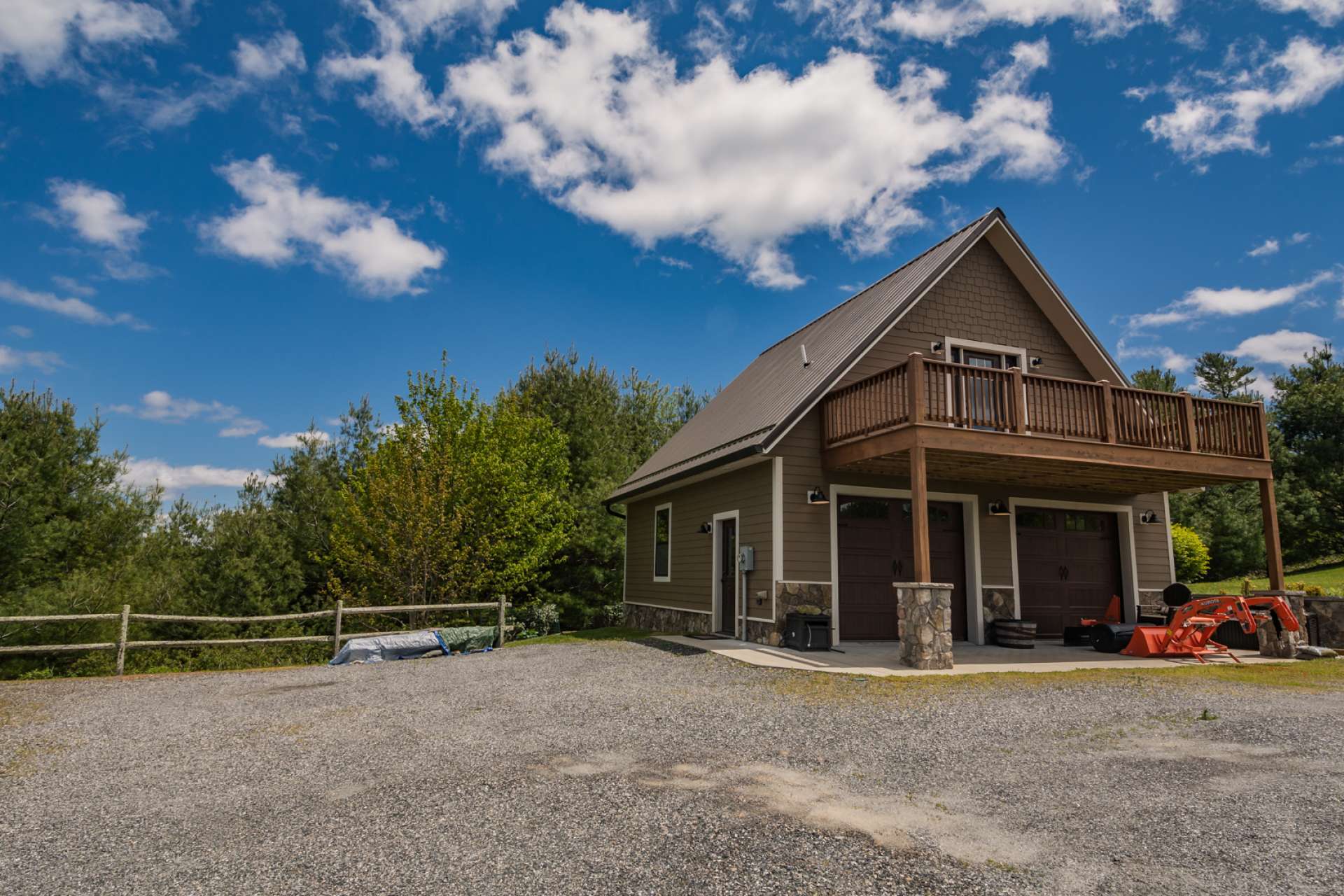 This newly constructed two-car detached garage is an amazing space with tongue and groove throughout, and a large bonus room above.