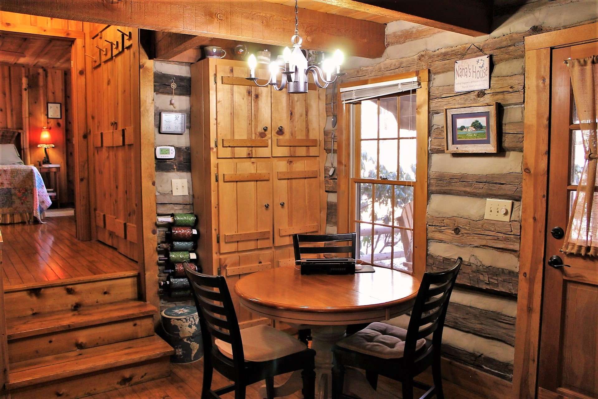 Dining area has view of the front yard and porch. A built-in cabinet provides extra storage for pantry items, dishes, etc.