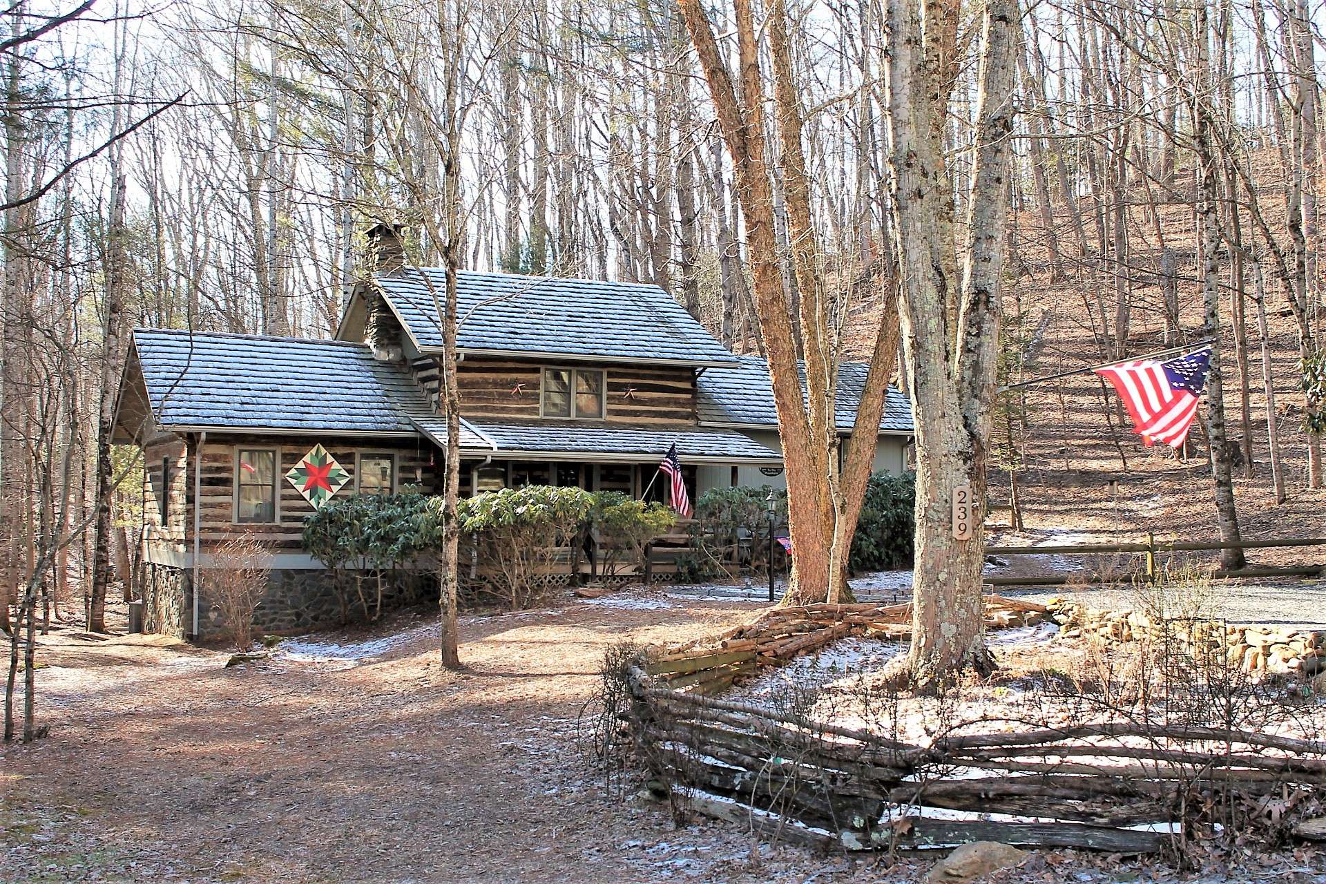 Flat level yard with plenty of parking area for family and guests. This property has native rhododendon bushes and a beautiful flower garden to provide a beautiful first impression to the cabin.