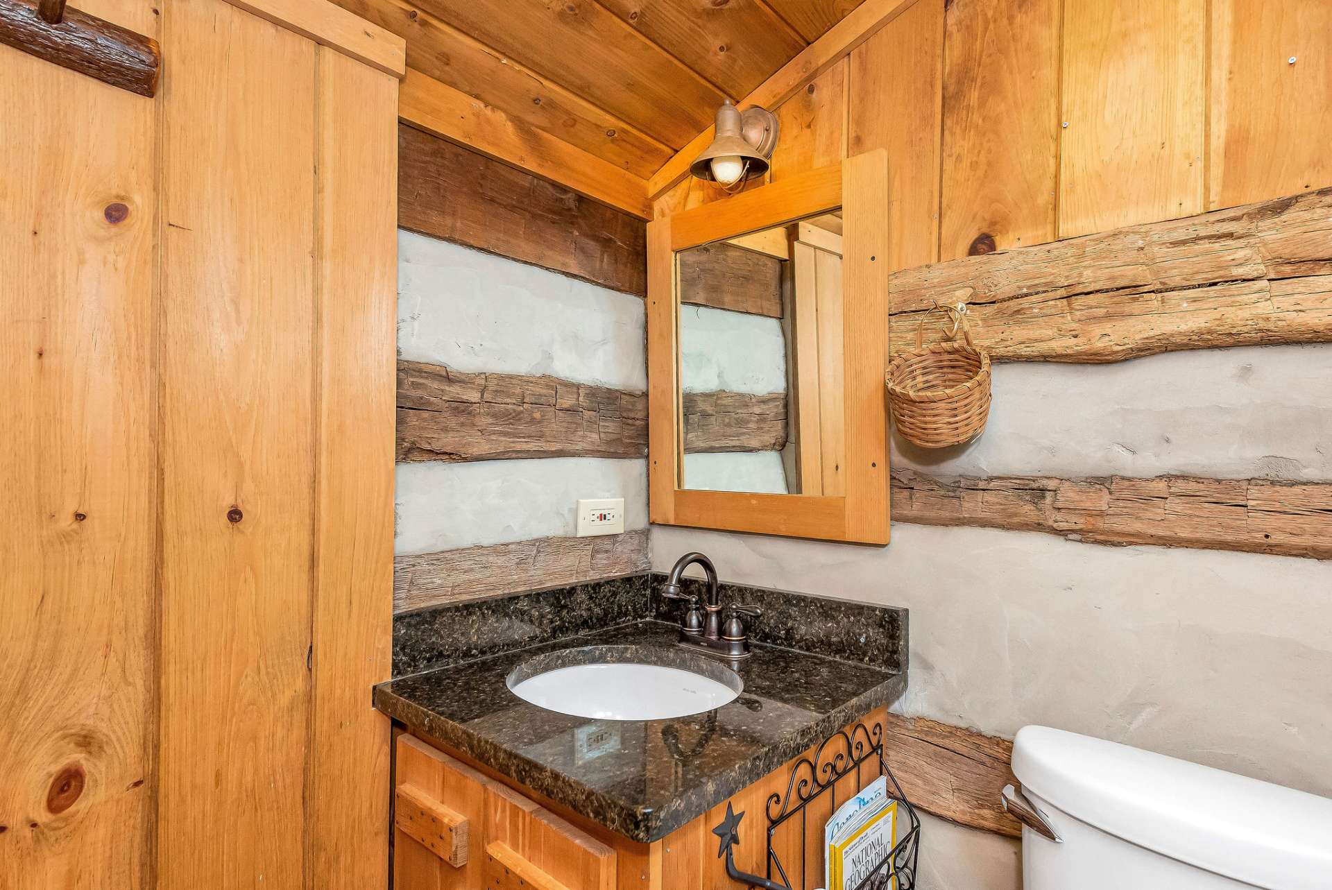 The second full bath is also adorned with a beautiful granite countertop.