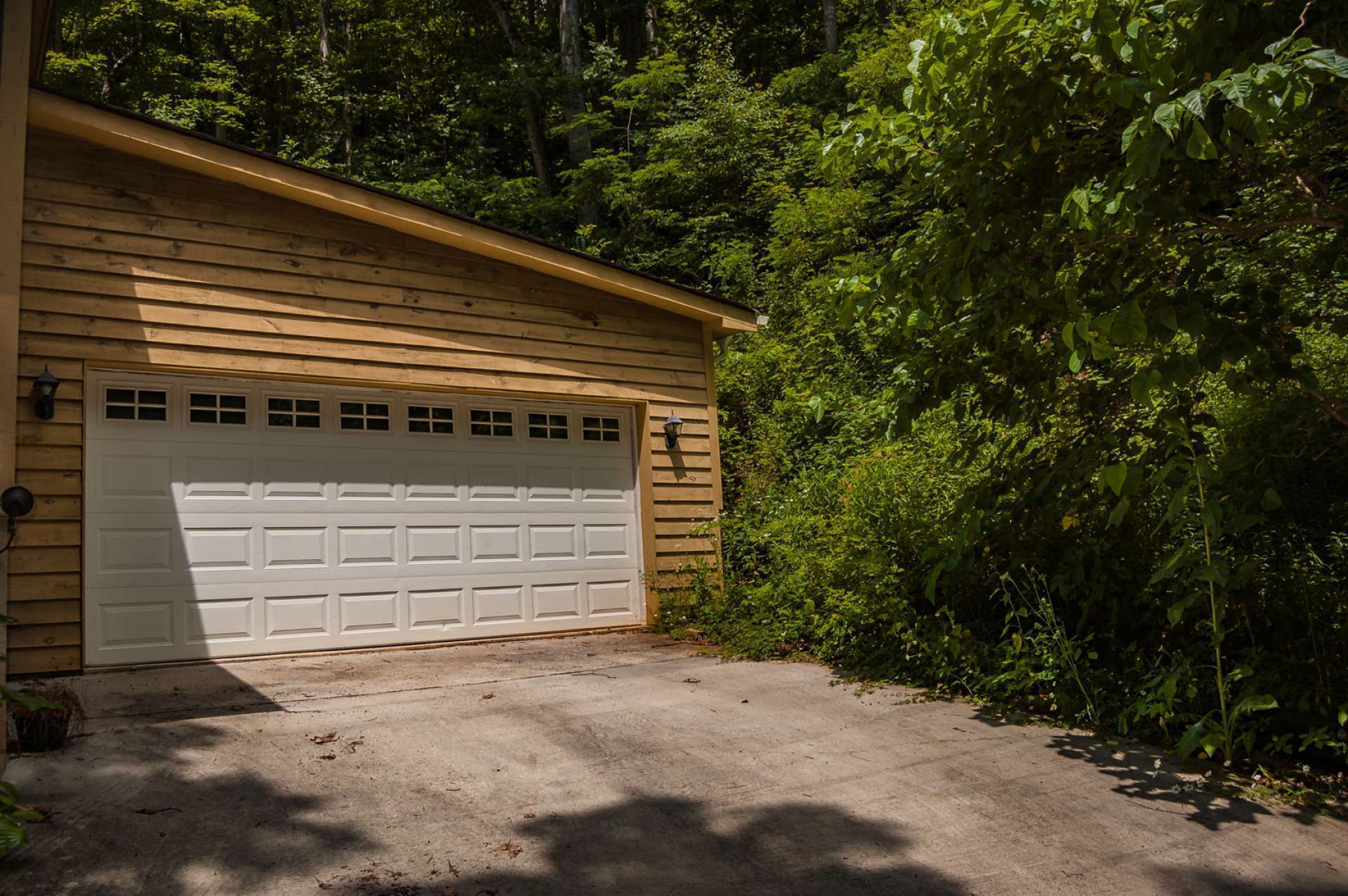 Attached 2-car garage with storage.