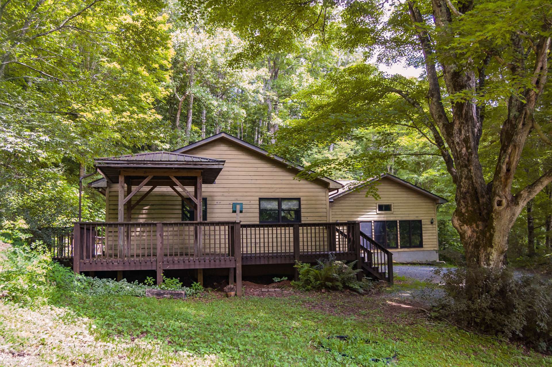 The deck is a great place to spend time enjoying mountain living.   Call today for additional information on our listing L188, the 3-bedroom, 2-bath home on 2+ acres in Southern Ashe County, NC Mountain high country.   L188