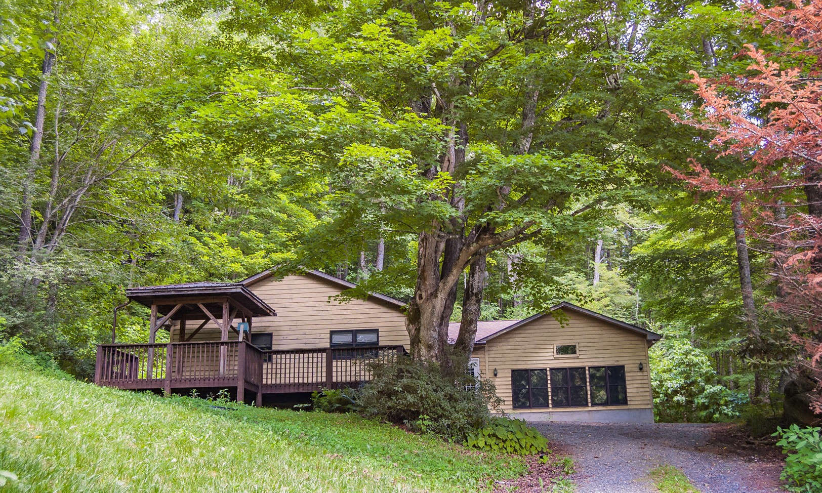This 3-bedroom, 2-bath traditional style home offers a great Southern Ashe County NC location convenient to Boone, West Jefferson, and many  NC High Country  destinations.