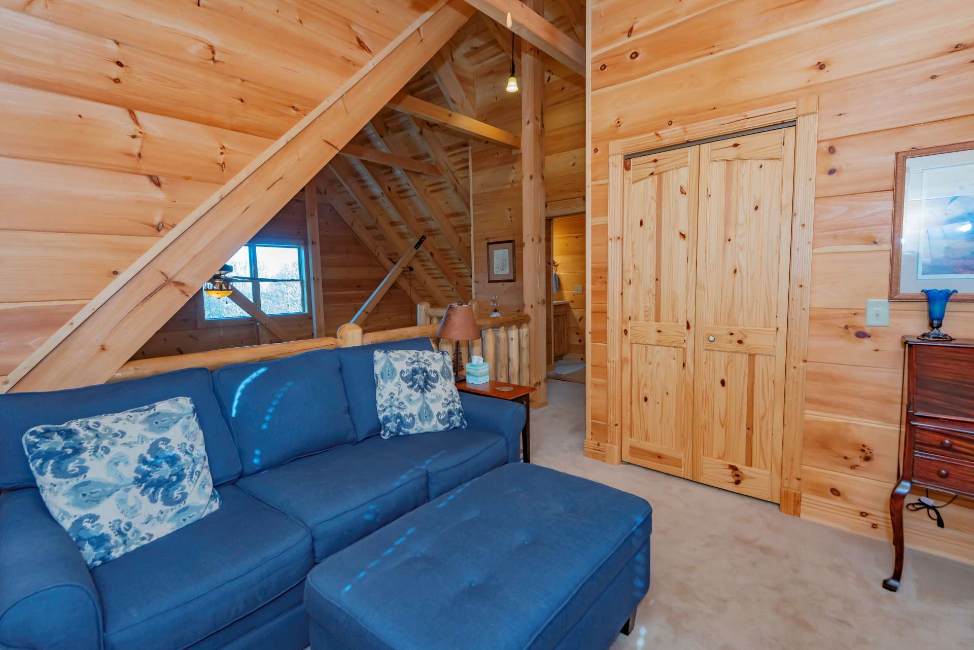 The upper level also offers a guest bedroom and full bath.