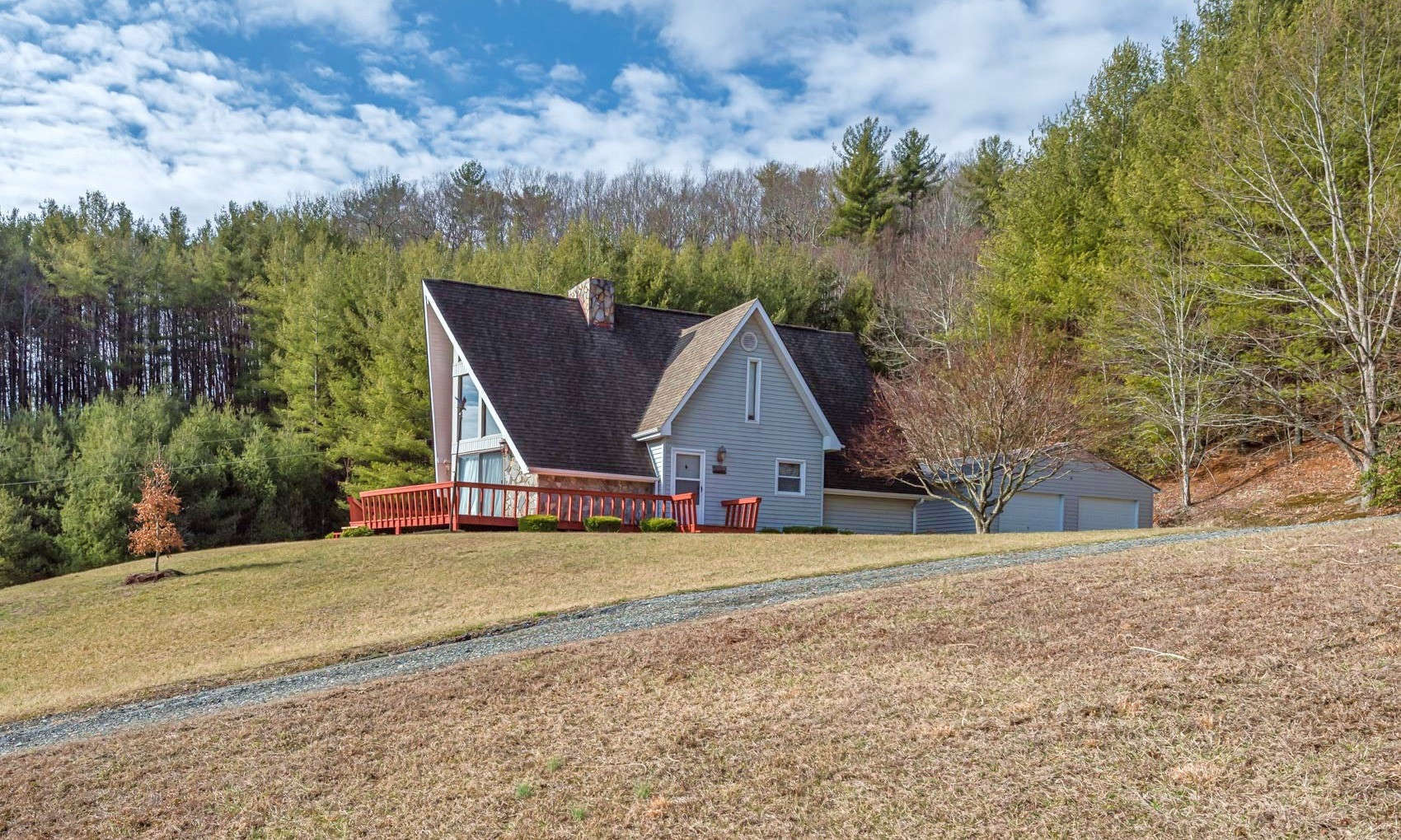 First time on the market! This spacious 3-bedroom, 2.5-bath mountain chalet is nestled among 5.54 acres in the Fleetwood area of Southern Ashe County, NC.
