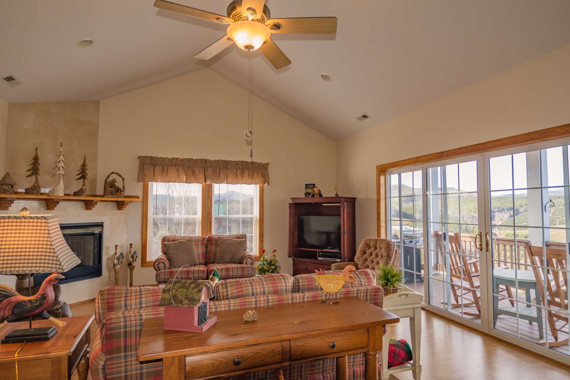 Double French Doors enable enjoyment of the views throughout all four seasons in the NC Mountains, and provide easy access to the back deck for outdoor grilling, dining, and entertaining.