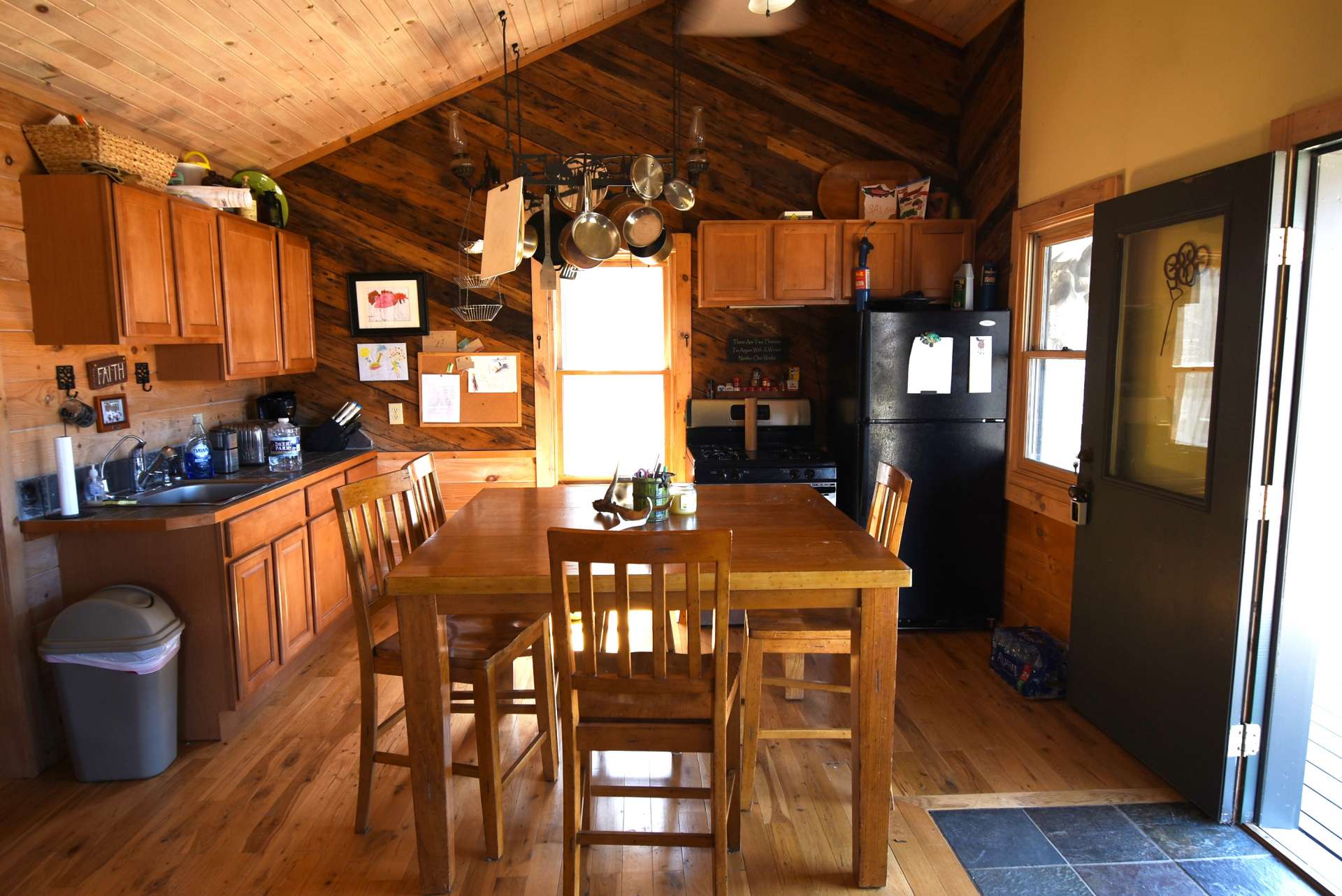 The living area is open to the kitchen and dining areas. The step saving kitchen offers ample space for preparing a quick meal or entertaining dinner guests. Or, step outside to the open deck for outdoor grilling and dining.