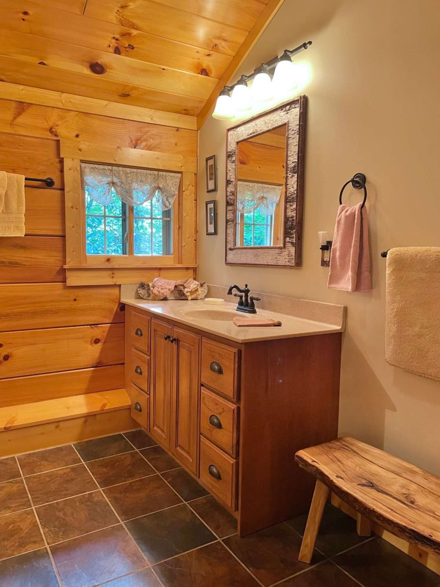 The upper level bath is also spacious and shared by the loft and two bedrooms.