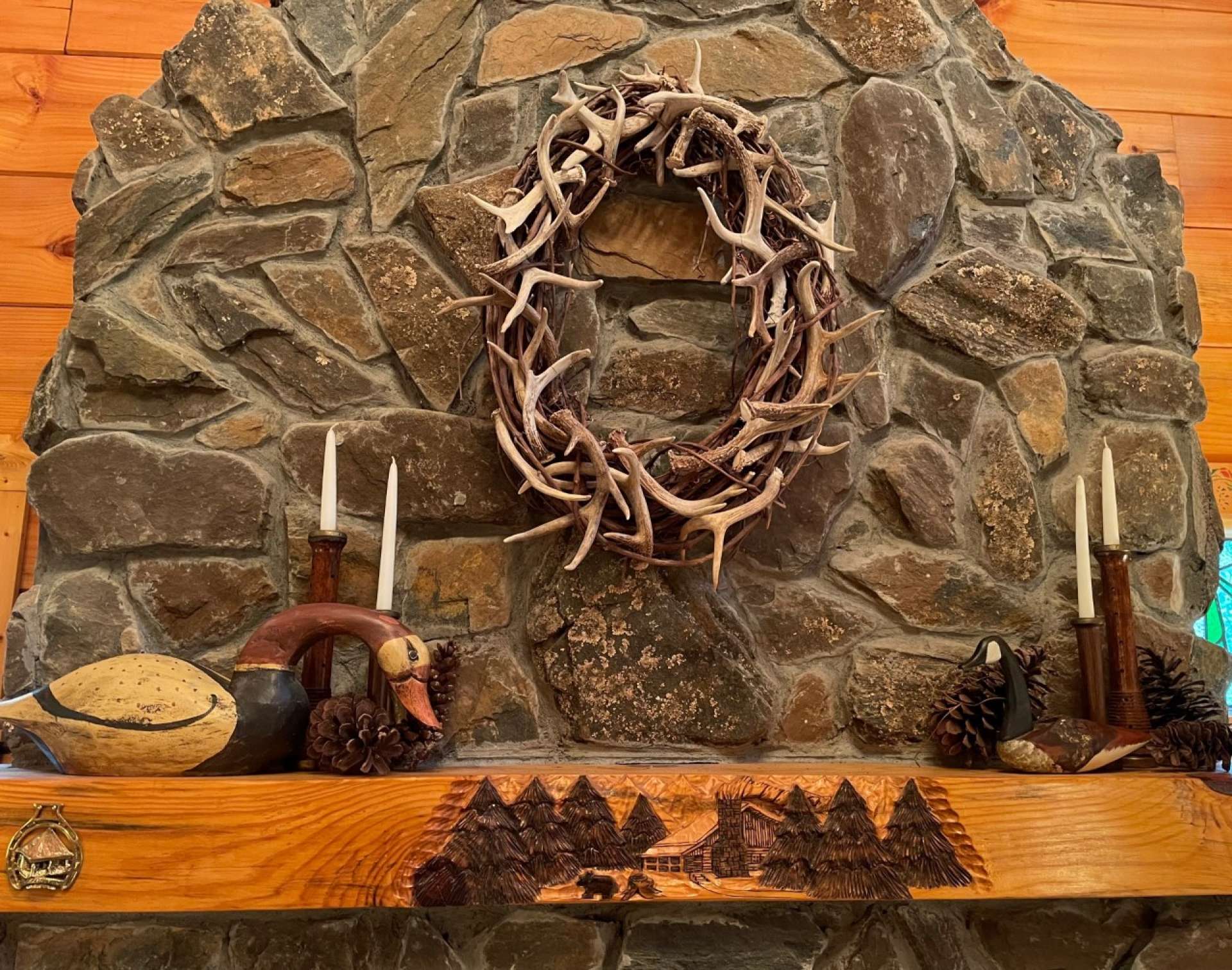 Notice the custom hand carved mantle.