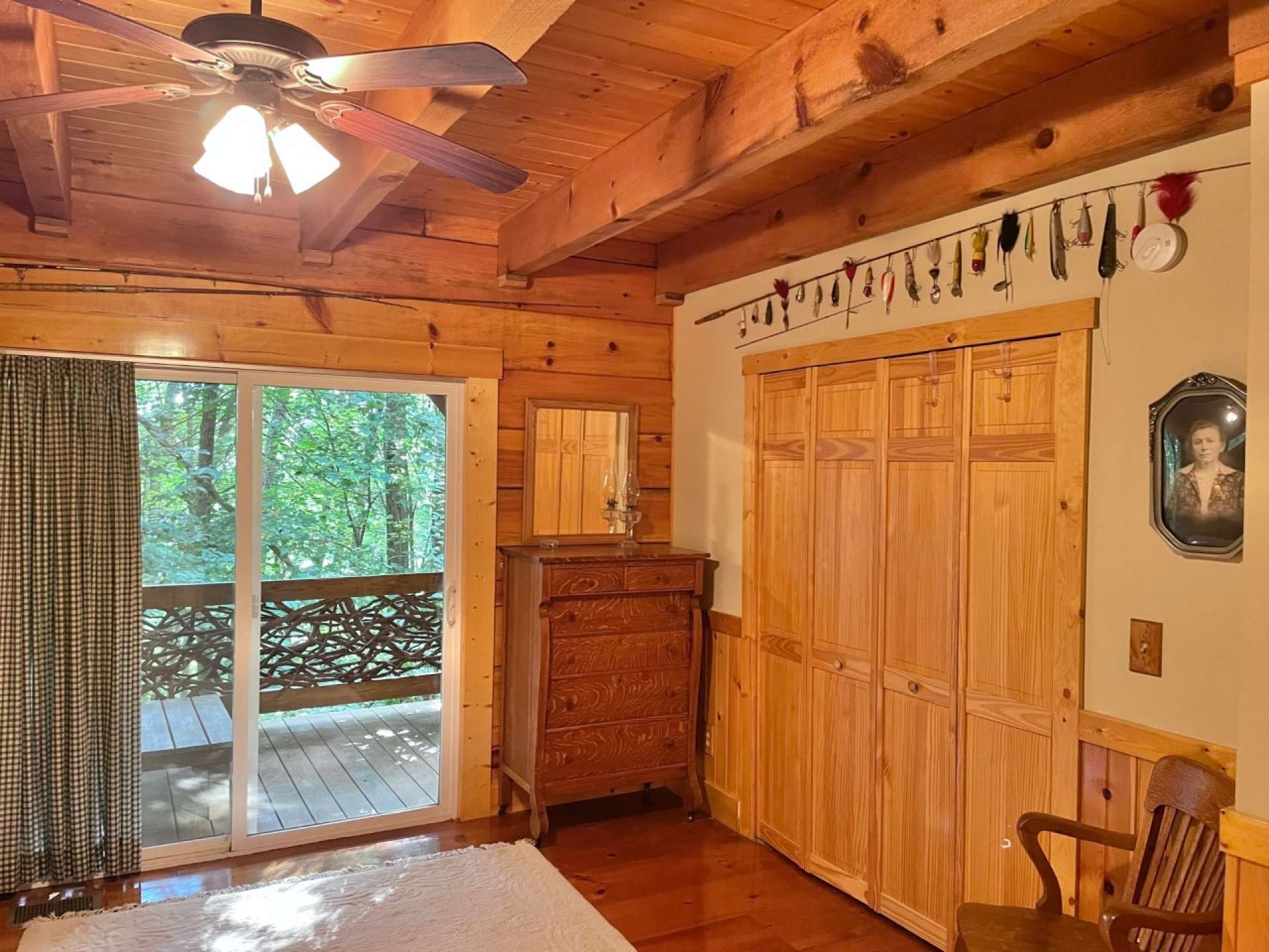 Patio doors leading to the covered back porch off the primary bedroom.