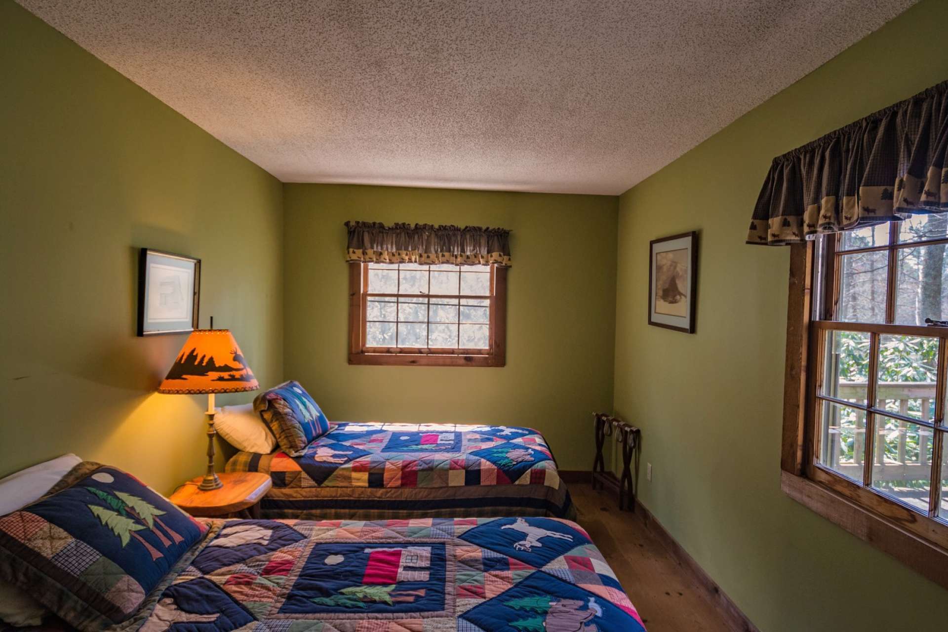 The  guest bedroom is roomy with plenty of natural light.  A second full bath with laundry closet completes the floor plan.