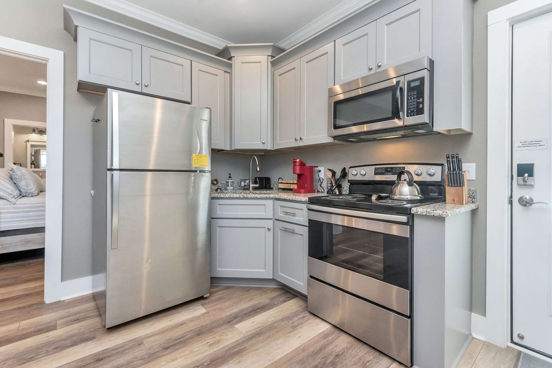 Each kitchen offers granite counter tops and stainless appliances.