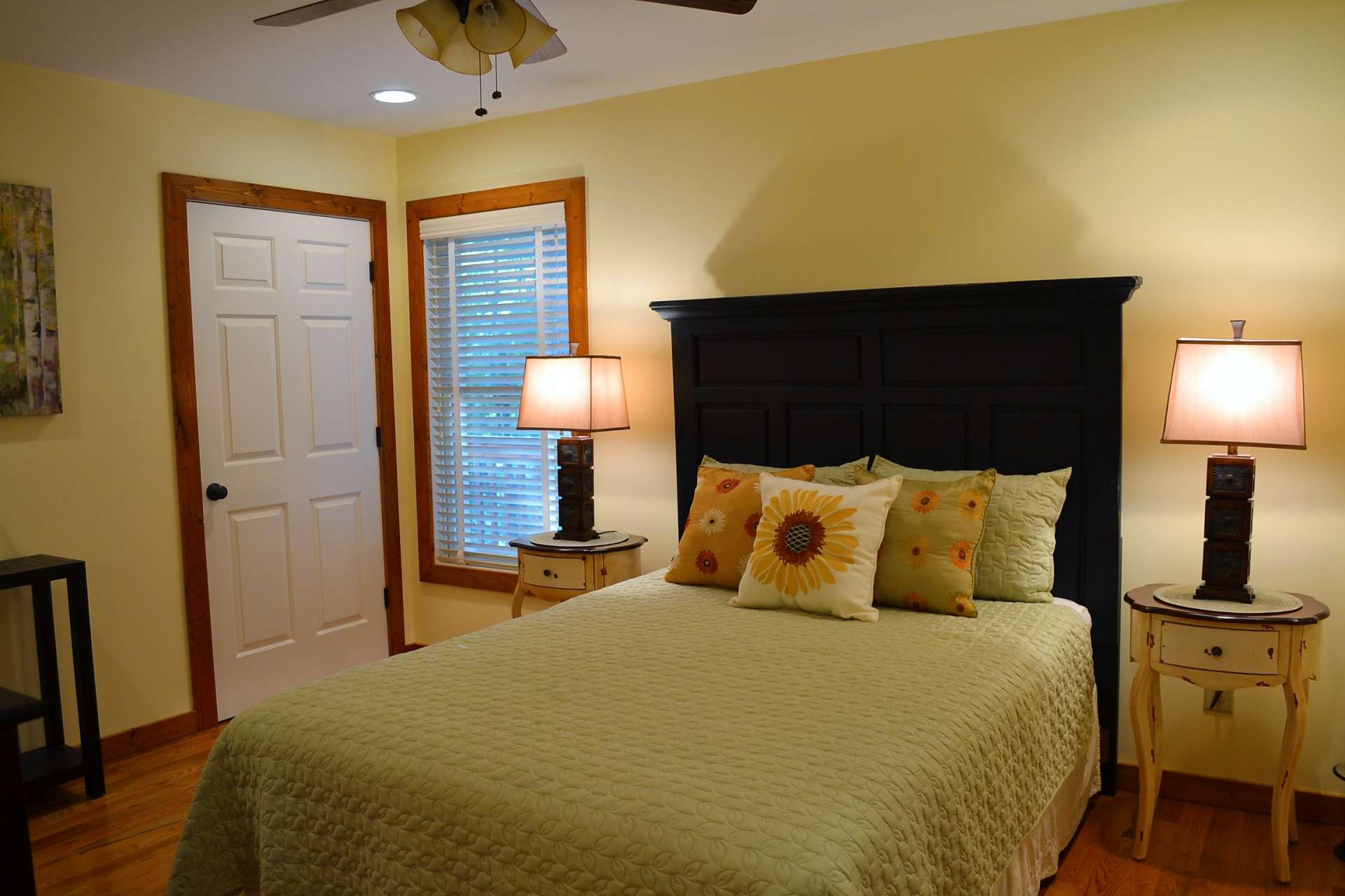 The guest bedroom is just as lovely and offers plenty of space for large bedroom furniture.