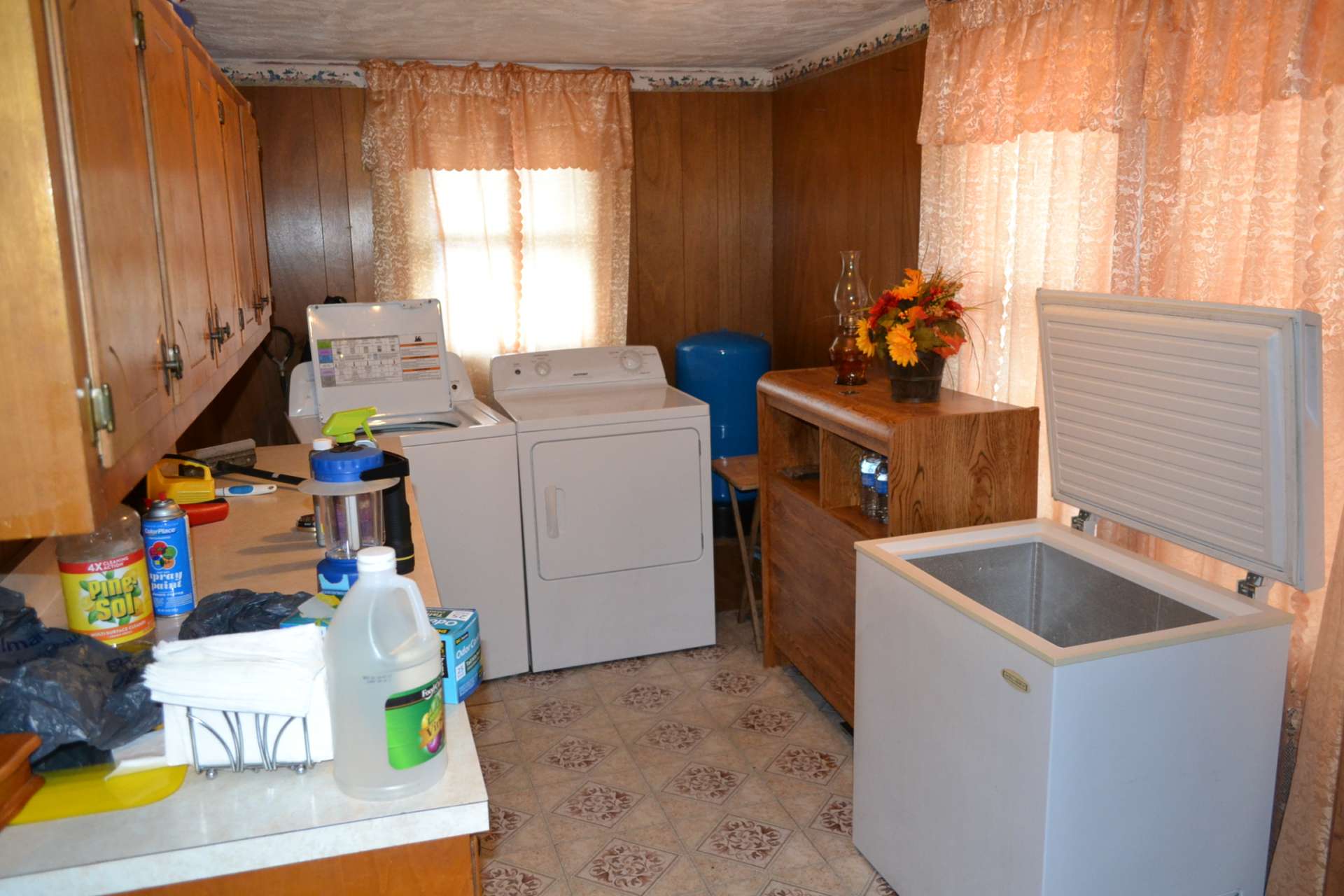 Accessed from the kitchen and this room is home to the laundry area and perfect for storage or mud room with access to and from the outdoors.