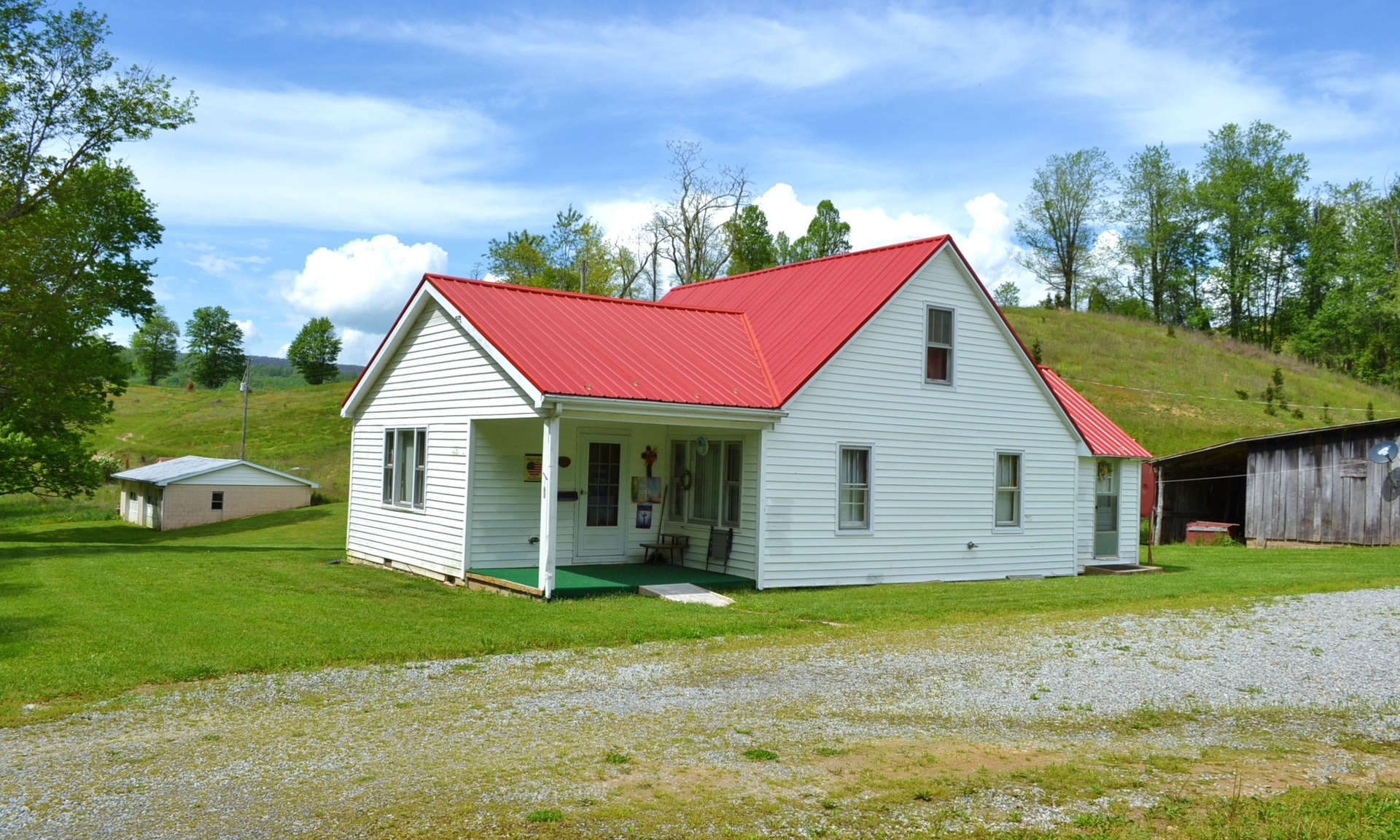 ATTENTION FARMERS, FIRST TIME HOME BUYERS, AND INVESTORS! Take a look at this sweet 442+ acre farm complete with cozy farmhouse, garage. big barn, multiple outbuildings, mountain streams, pastures, woodlands, several building sites, and lots of wildlife.