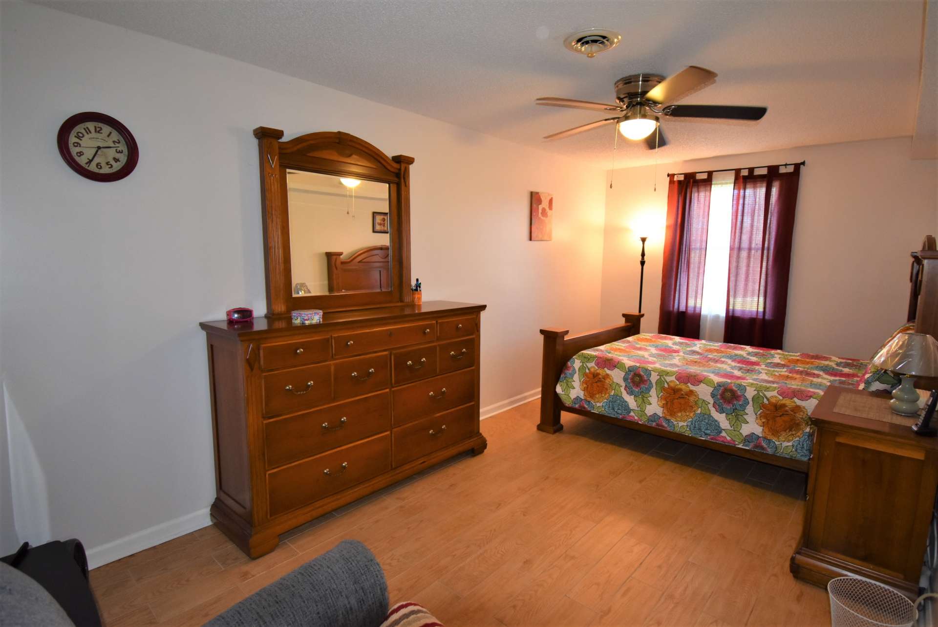 This spacious lower level bedroom provides plenty of space for sitting area and TV.  This home is set up for a four bedroom home with a  3-bedroom septic permit.