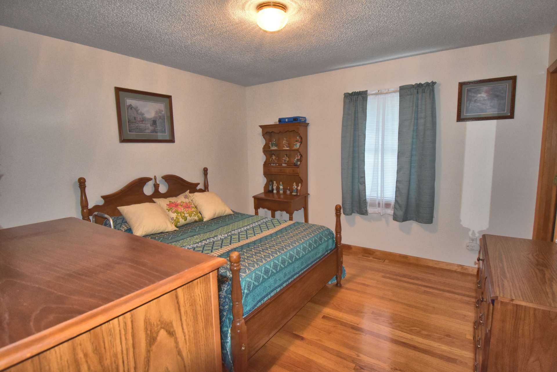 Each bedroom has hardwood floors. This is the master suite with a private bath.