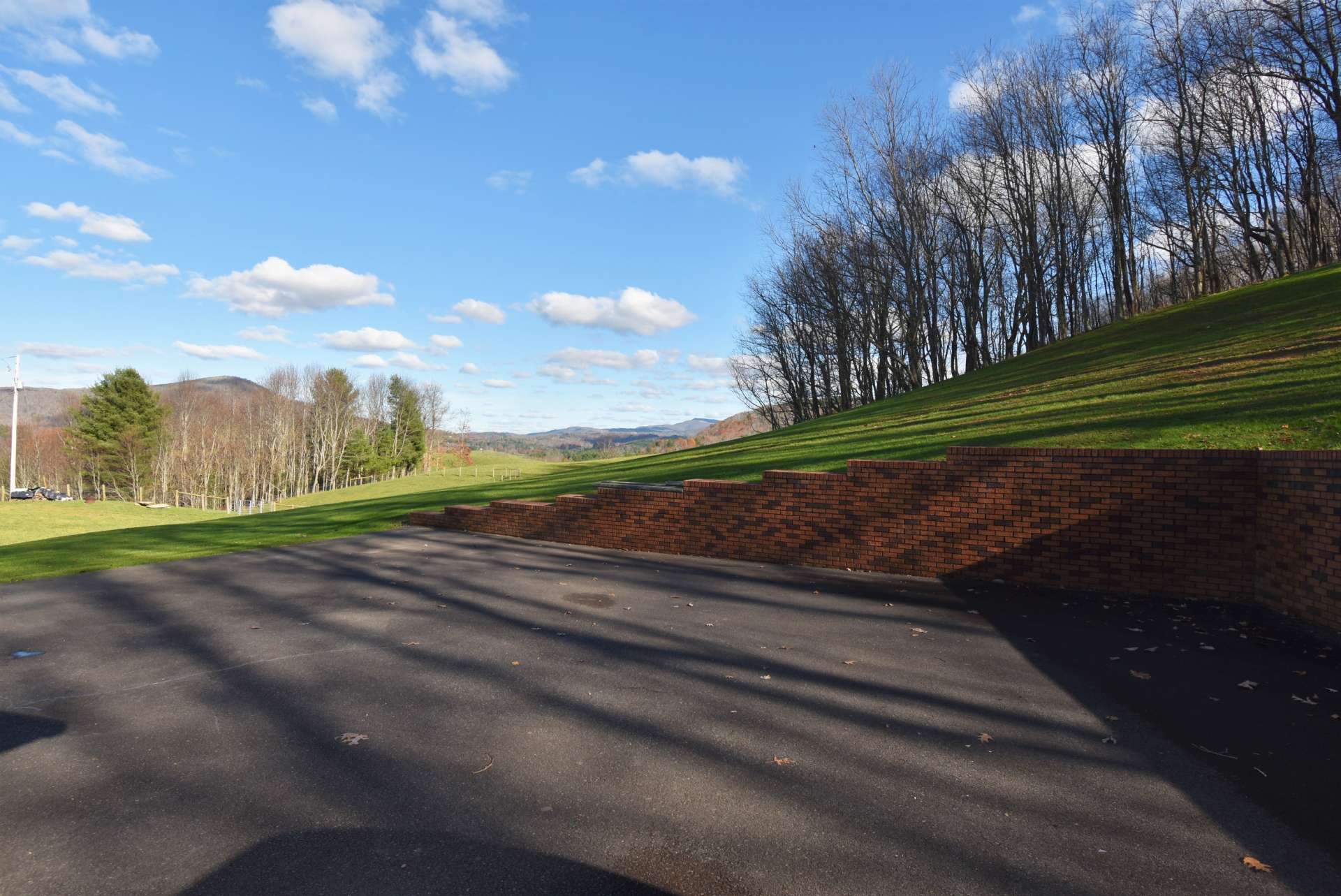 Plenty of parking space and a great space for a basketball goal.