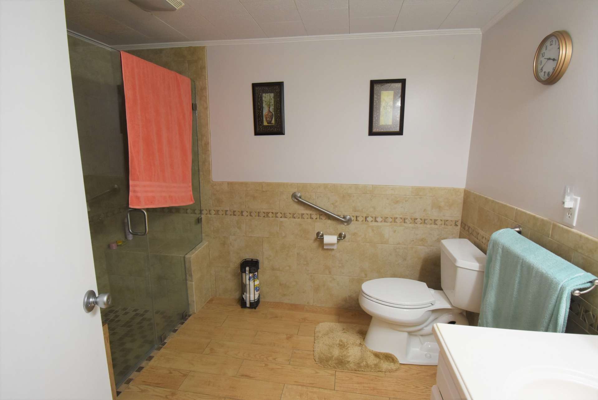 To complete the lower level is a full bath with walk-in ceramic tile shower.