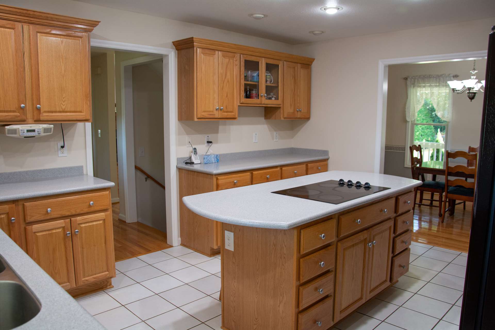 Counter tops are Corian, floor is ceramic tile and cabinets are oak.