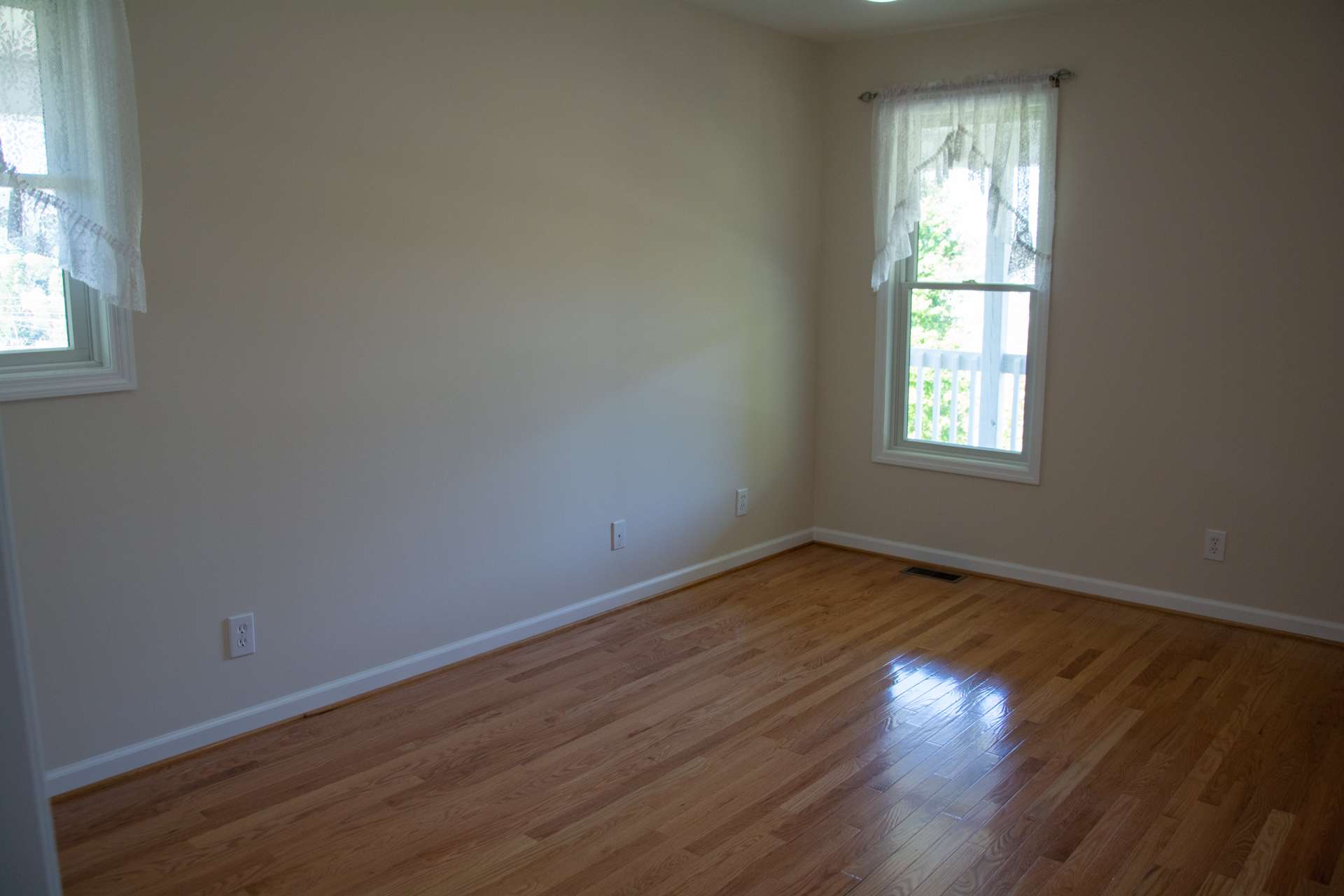 This bedroom is located on the main level.  The main level also offers a full bath with single vanity and fiberglass tub/shower.